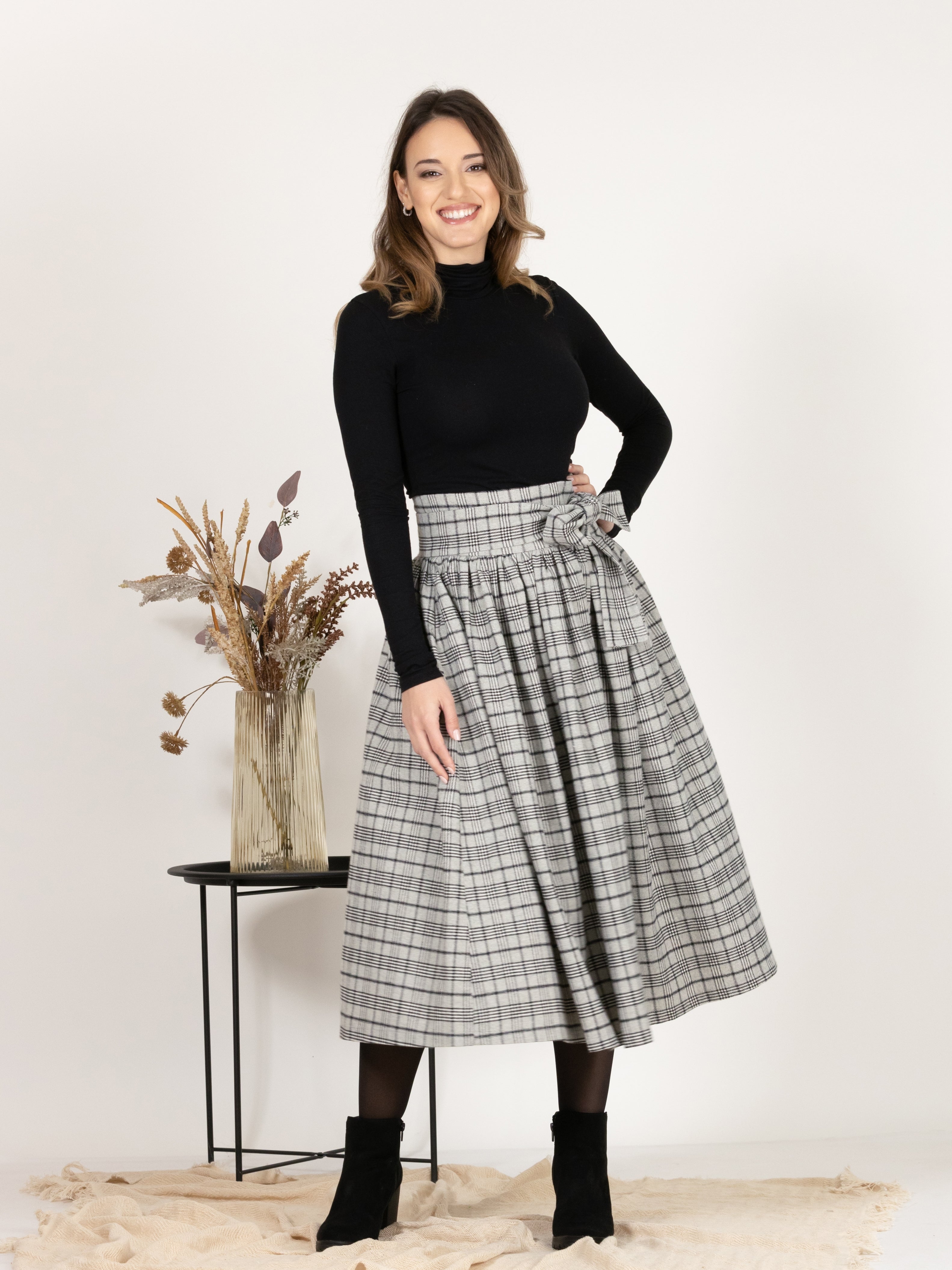 Front view of Wool Midi Plaid Skirt with High Waisted Bow and Pockets