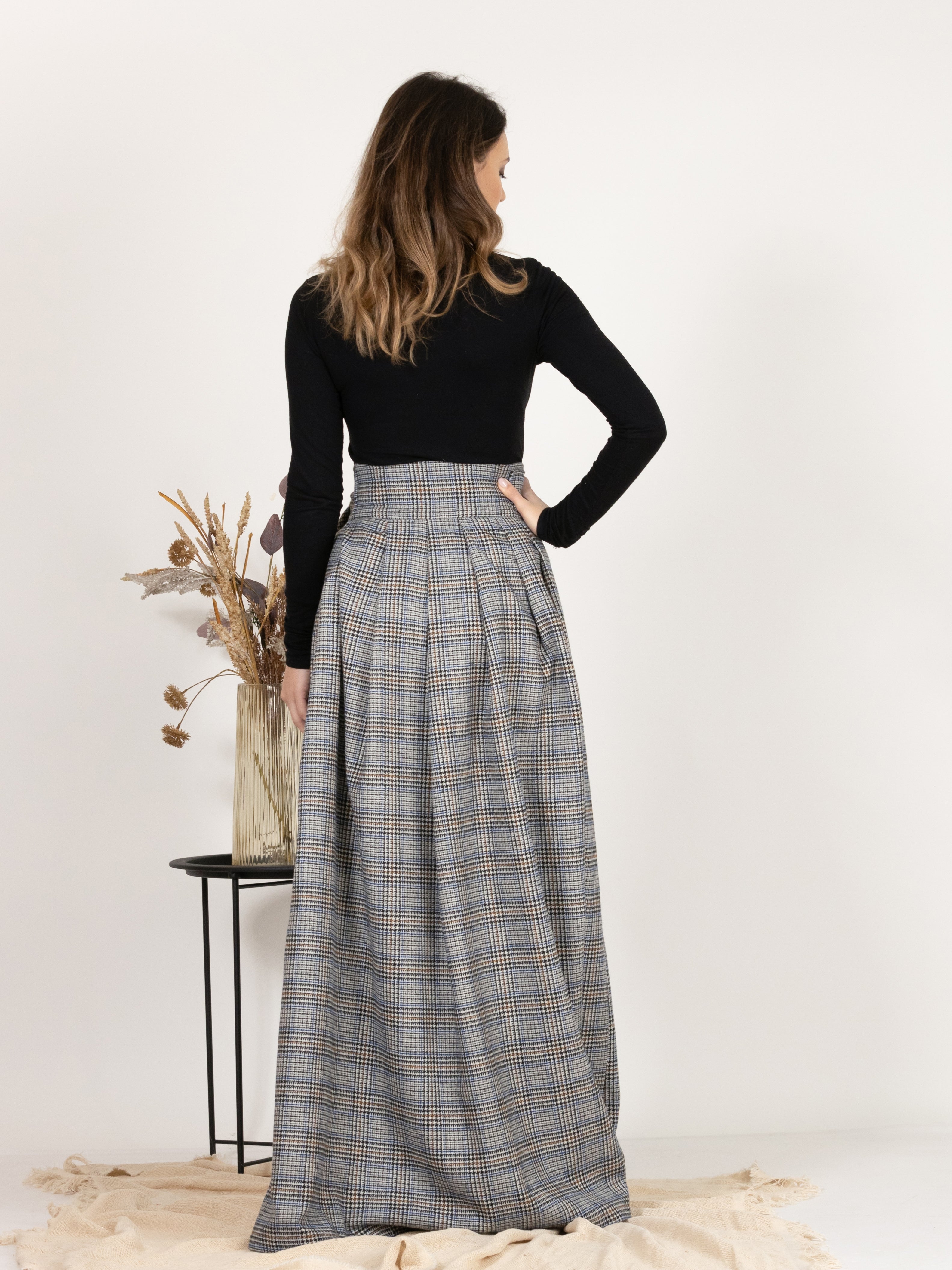 Back view showing the beautiful plaid pattern of Plaid Wool Pleated Skirt with Ultra High Waist and Bow