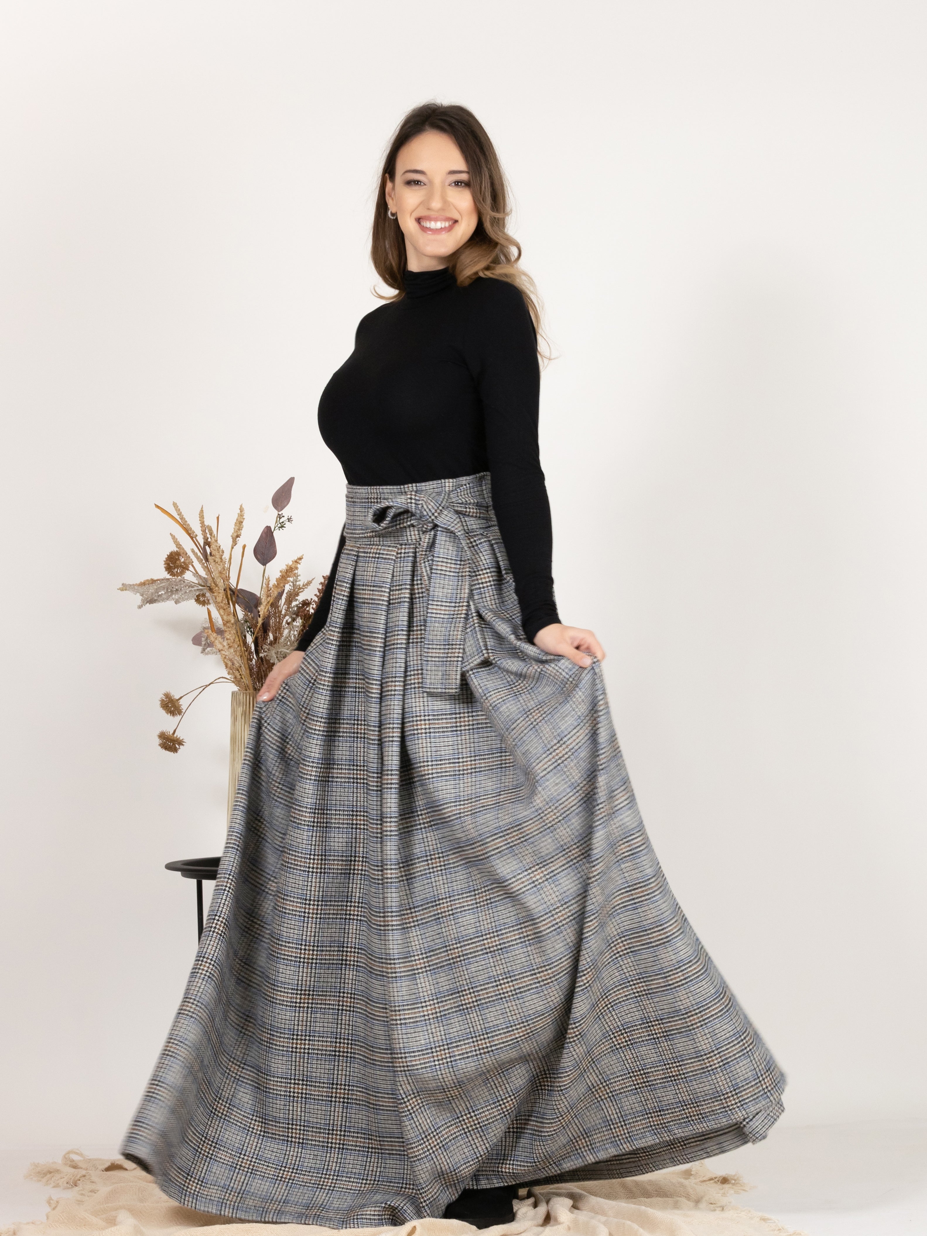 Side view of Plaid Wool Pleated Skirt with Ultra High Waist and Bow