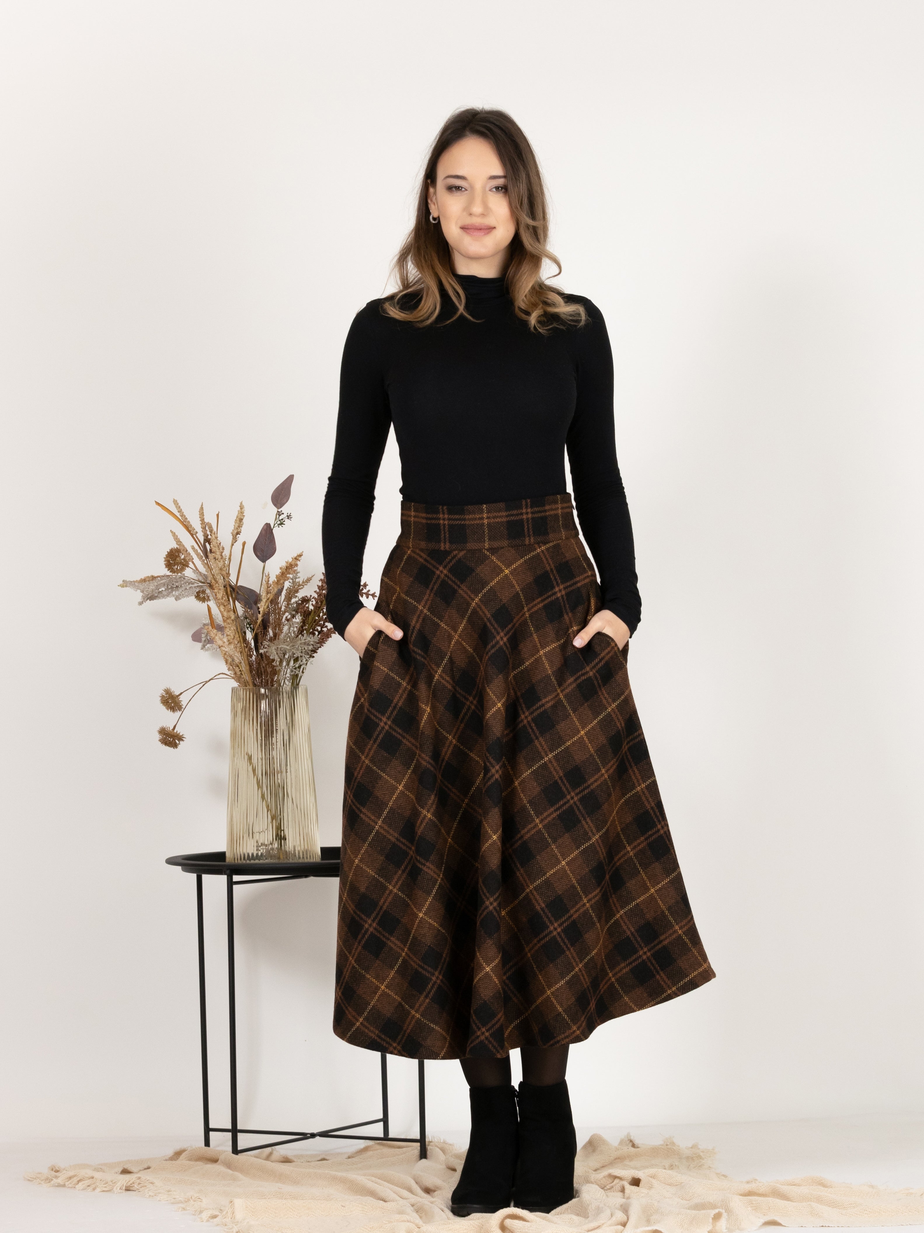 Front view of Midi Wool Plaid Skirt with High Waist and Pockets showcasing classic design