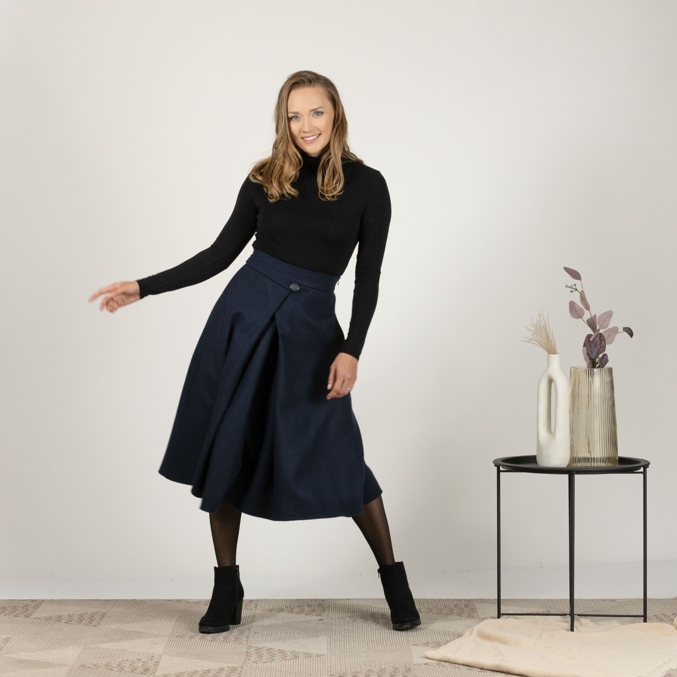 Elegant front view of Wool Front Statement Skirt with bold button feature