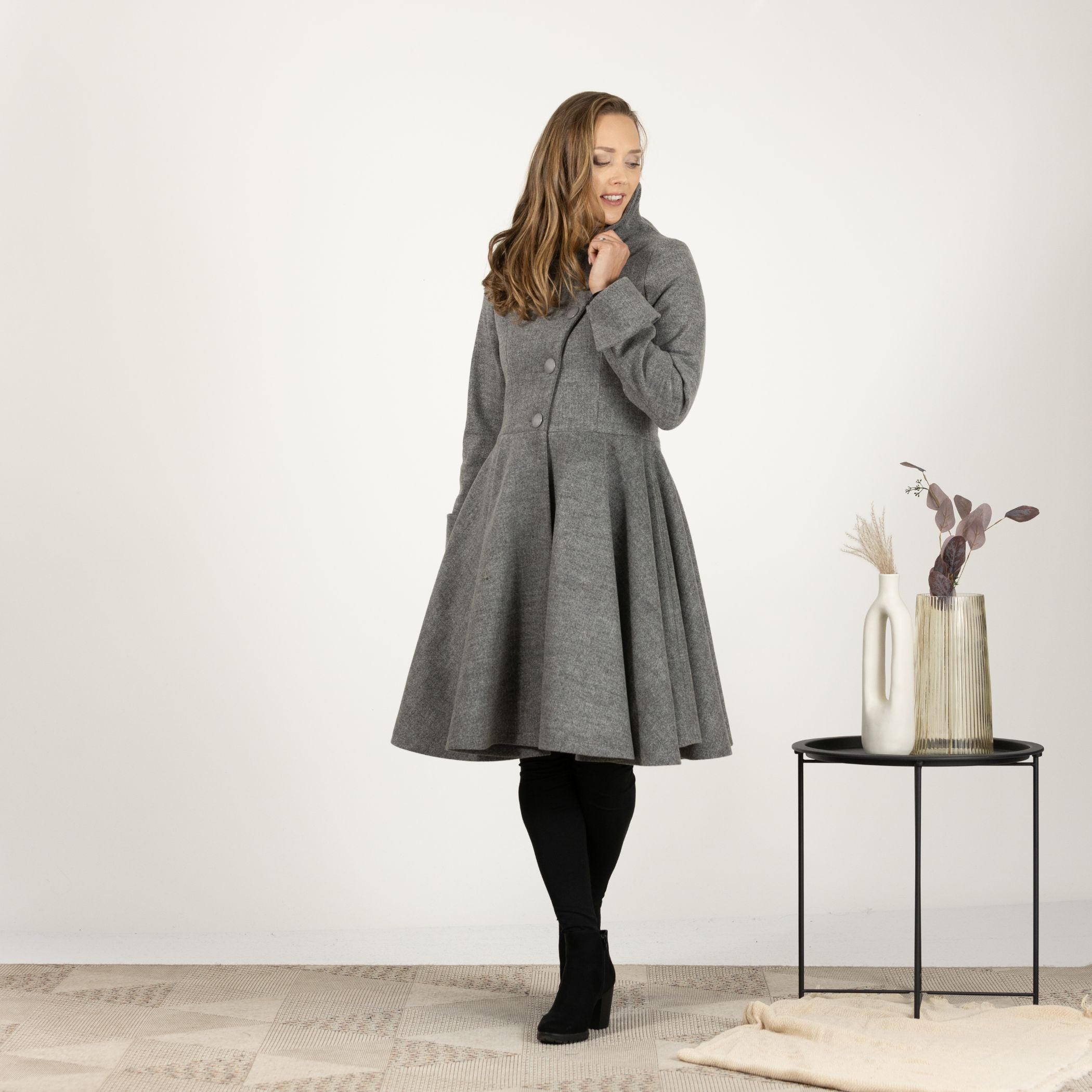 Side view of the Gray A-line Buttoned Winter Coat, showing the flattering A-line silhouette and the smooth drape of the wool fabric.