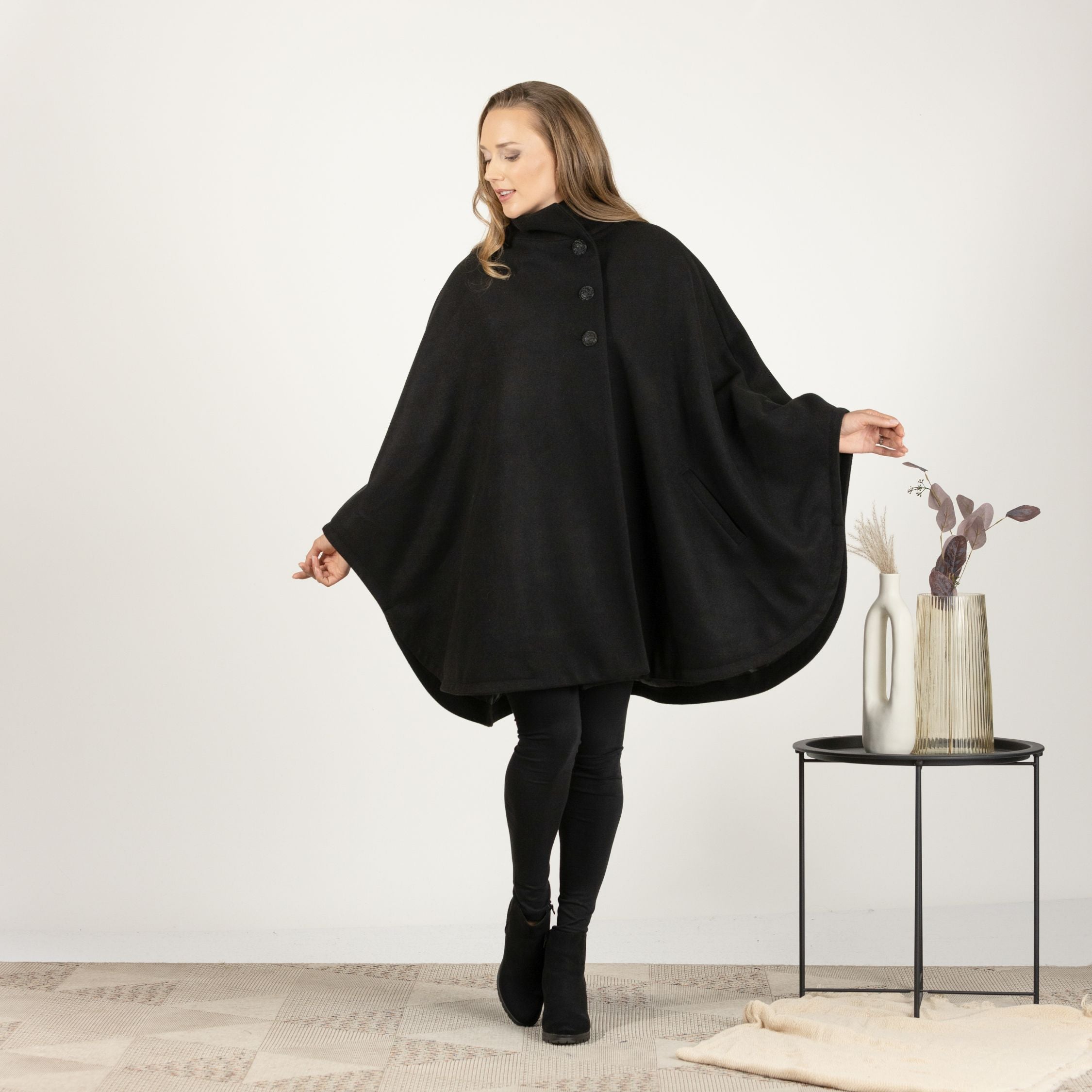 Front view of Wool Poncho Coat paired with a dress