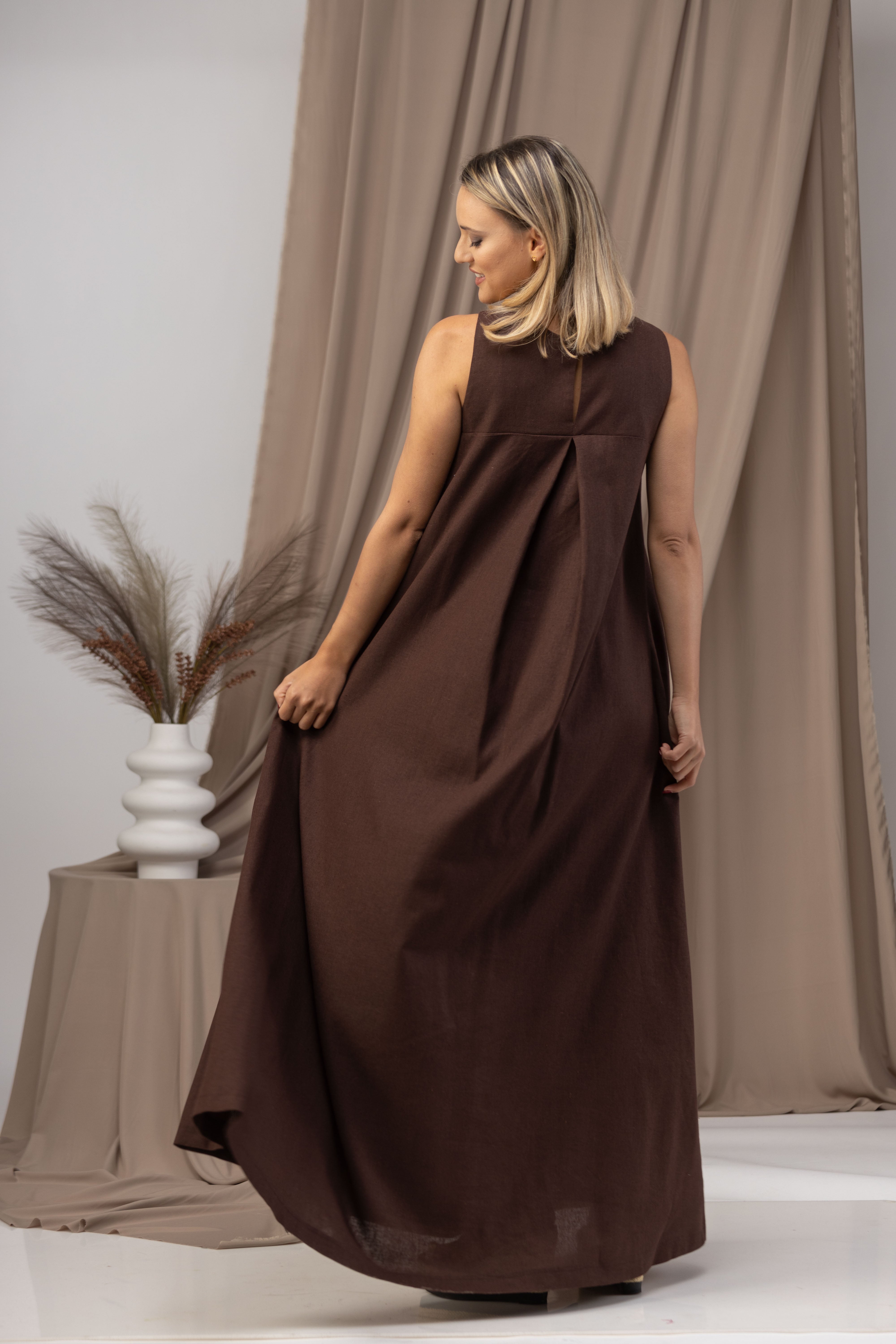 Back view of chocolate brown linen maxi dress