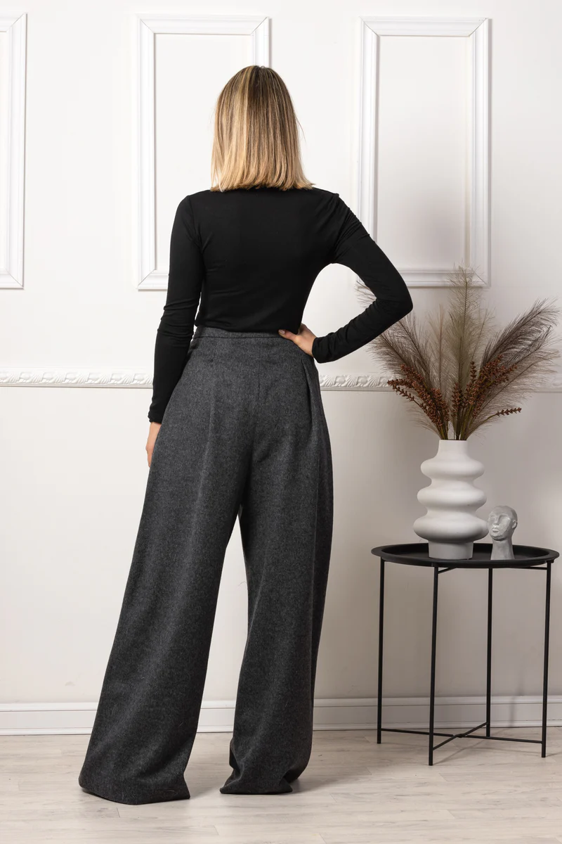 Back view of Modern wool trousers in wide-leg style
