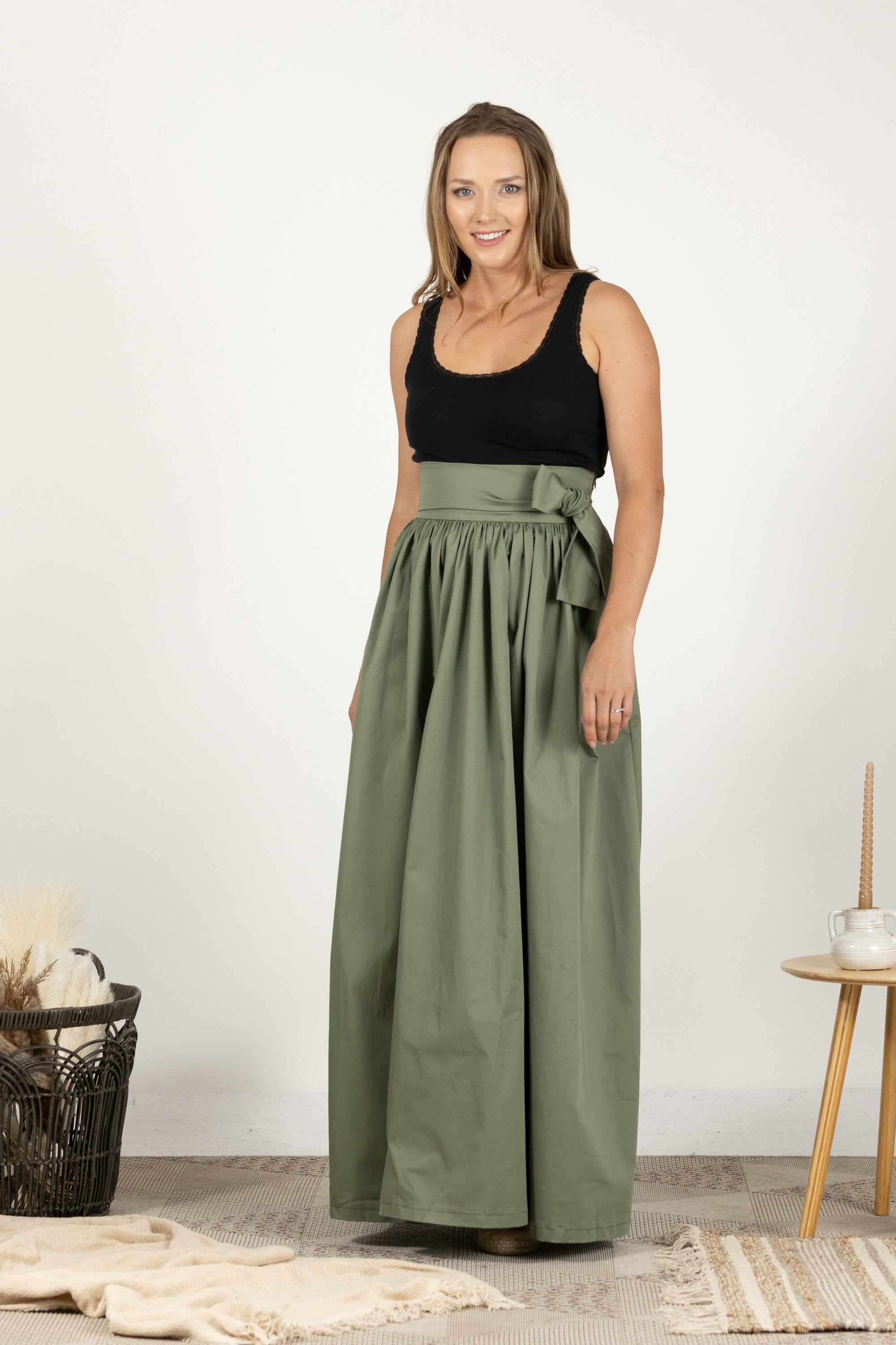 Modern dark green cotton skirt with a relaxed silhouette