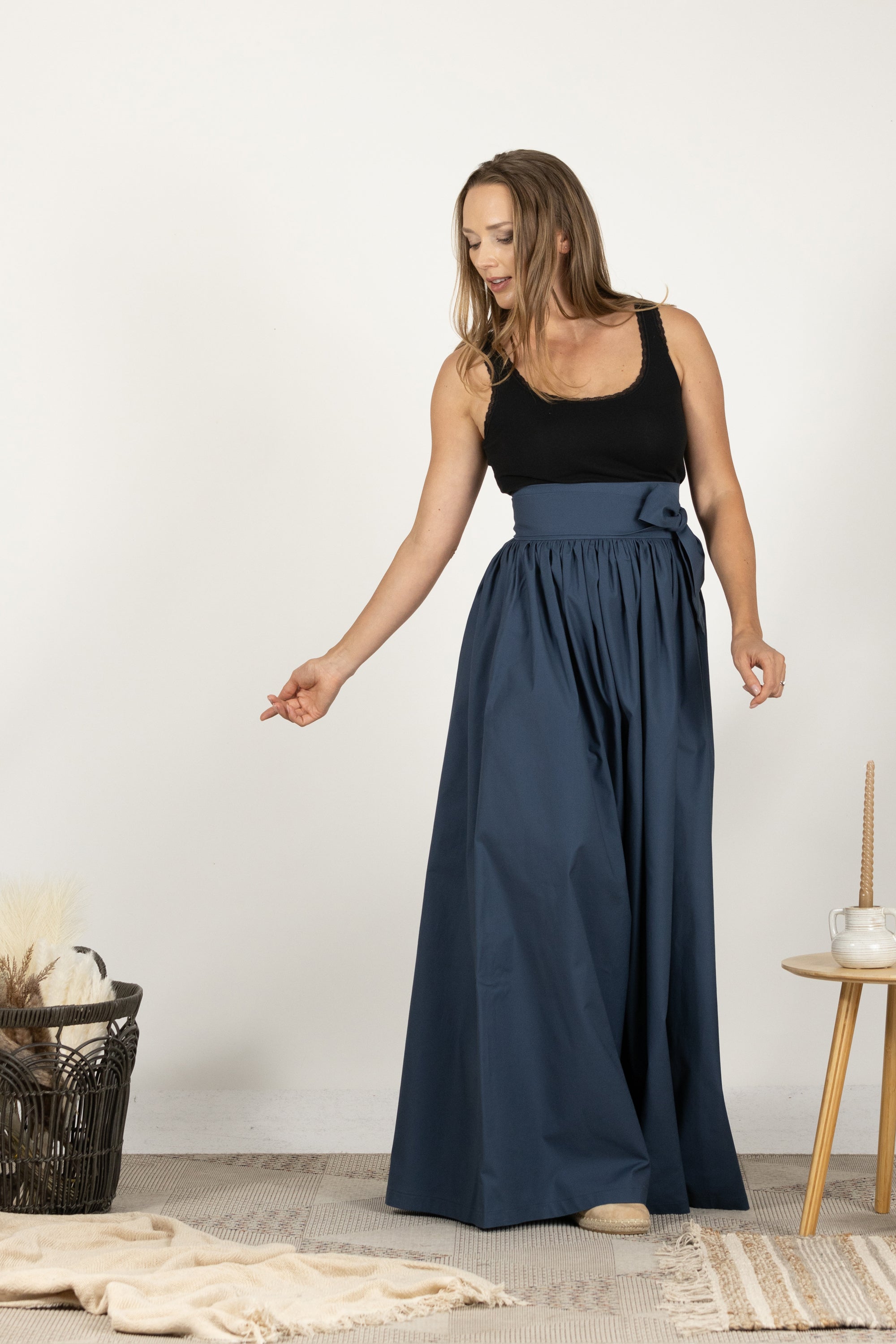 High-waisted dark green cotton skirt with loose fit