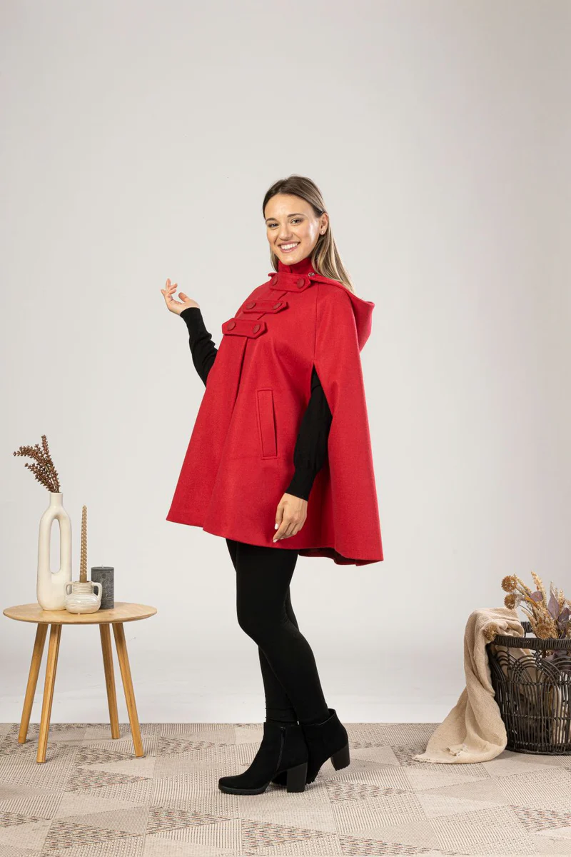 SIde view of red Stylish cape-style coat for cooler weather