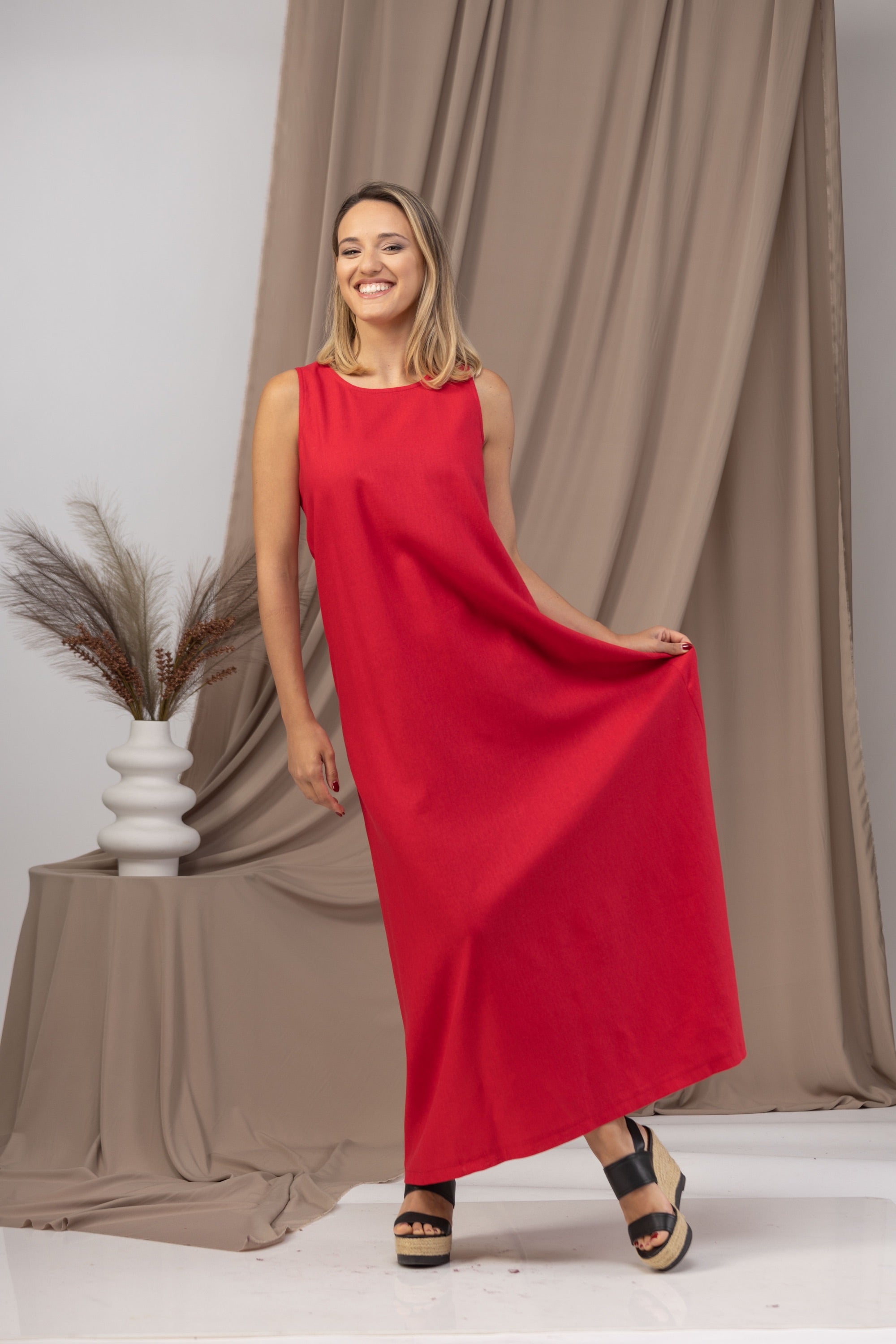 Minimalist Linen Maxi Dress being worn at a garden party - from NikkaPlace | Effortless fashion for easy living