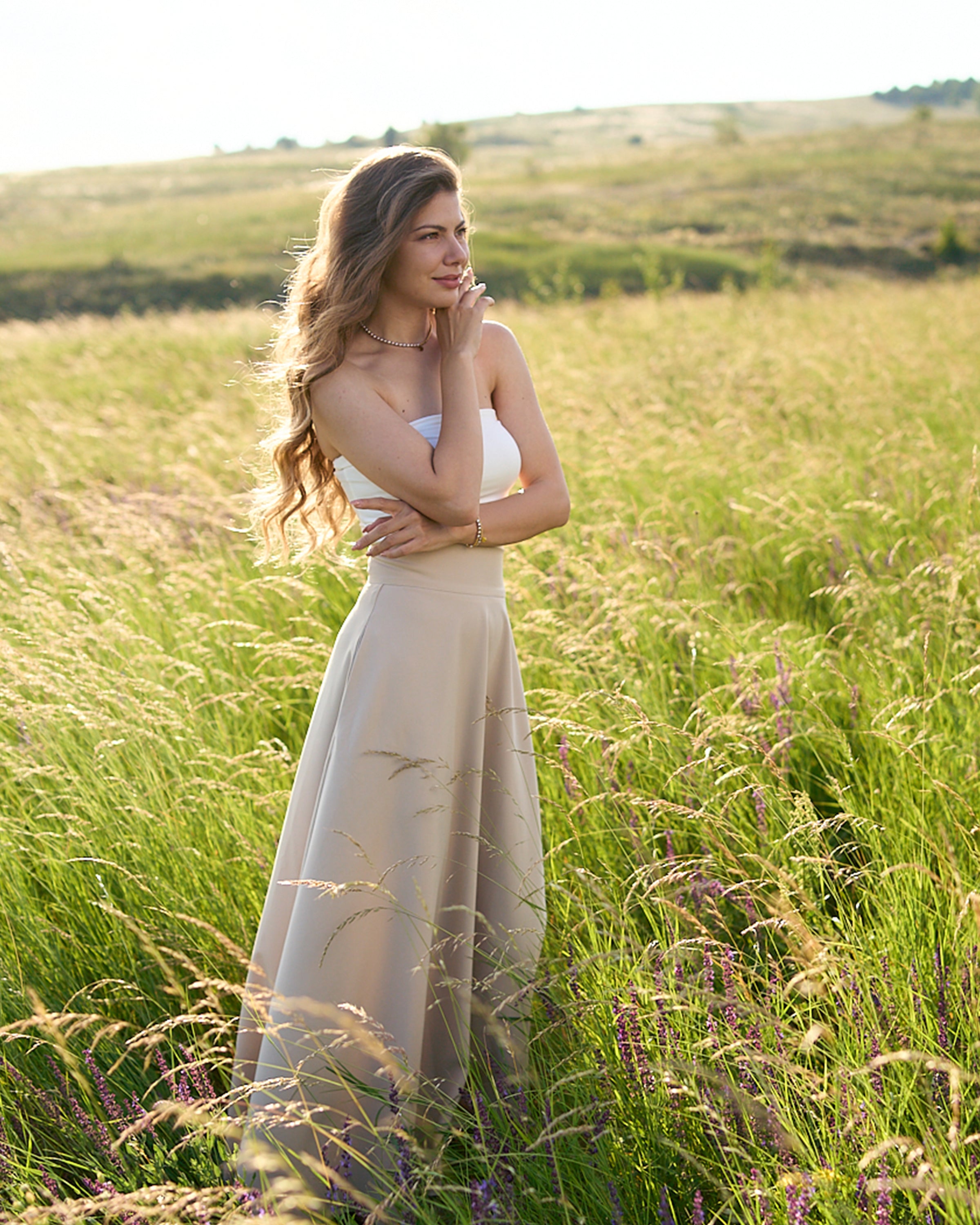Side view of maxi beige skirt