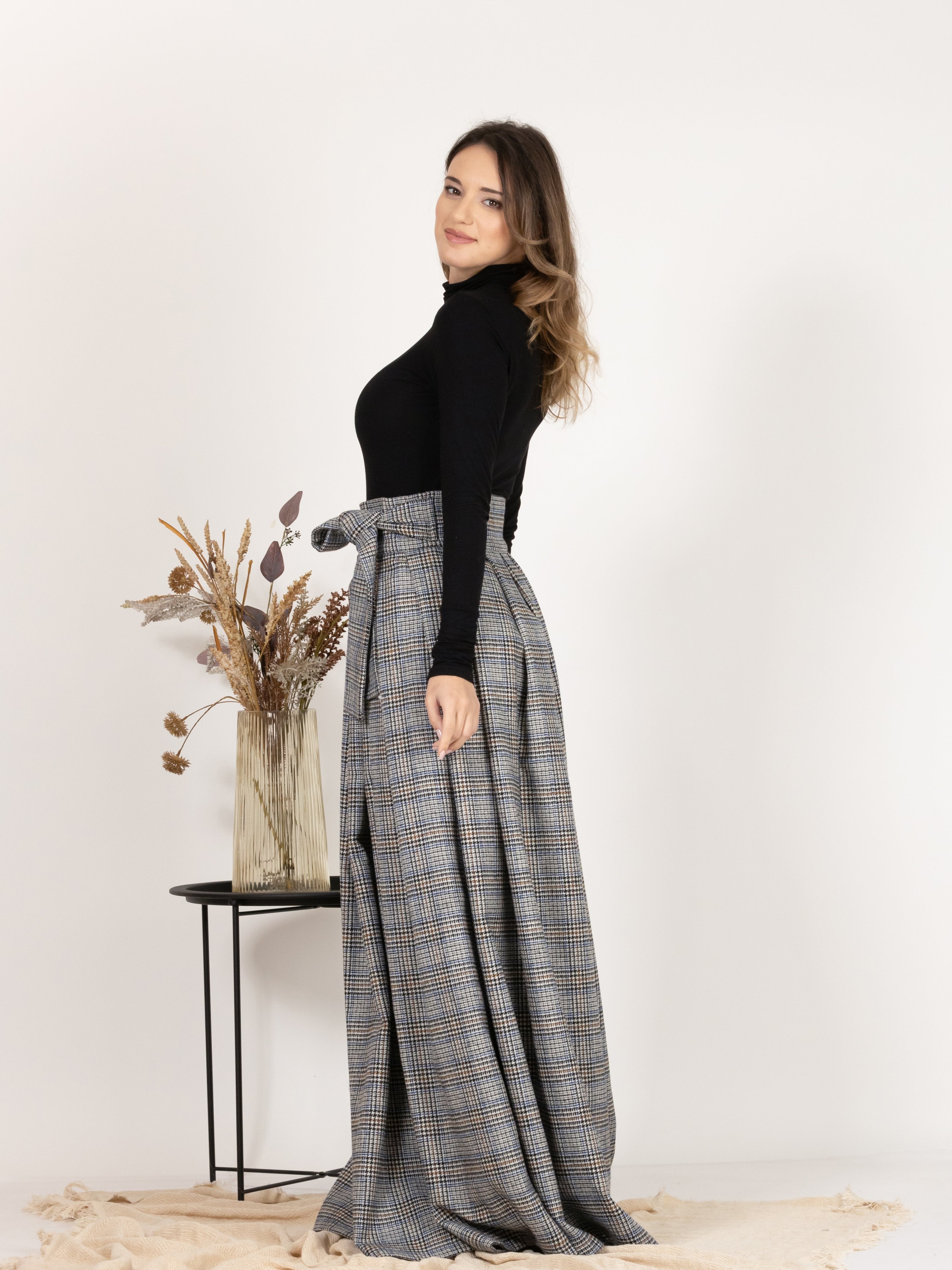 Side view of Plaid Wool Pleated Skirt with Ultra High Waist and Bow showing the maxi length