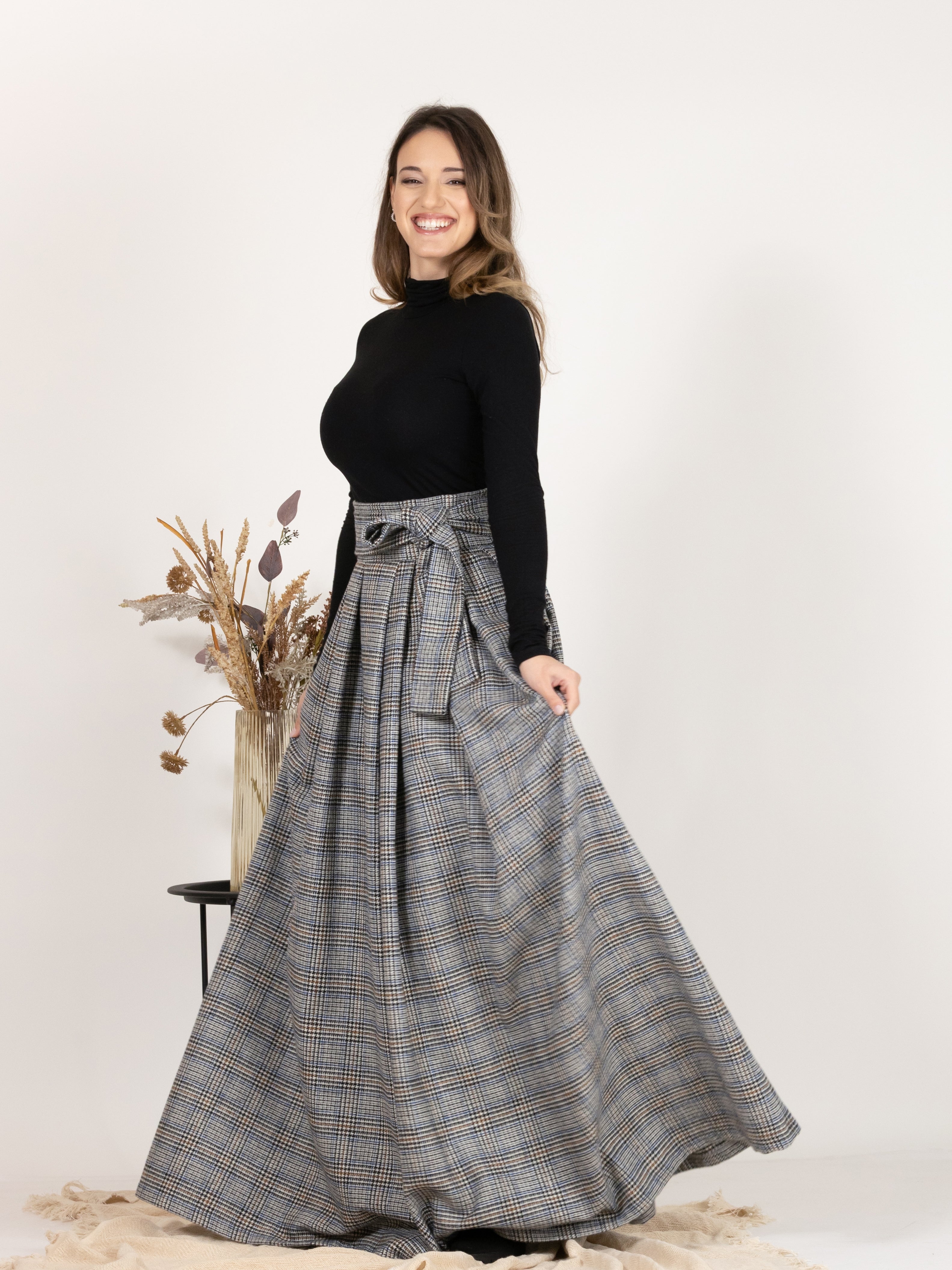Front view emphasizing the timeless, classic design of Plaid Wool Pleated Skirt with Ultra High Waist and Bow