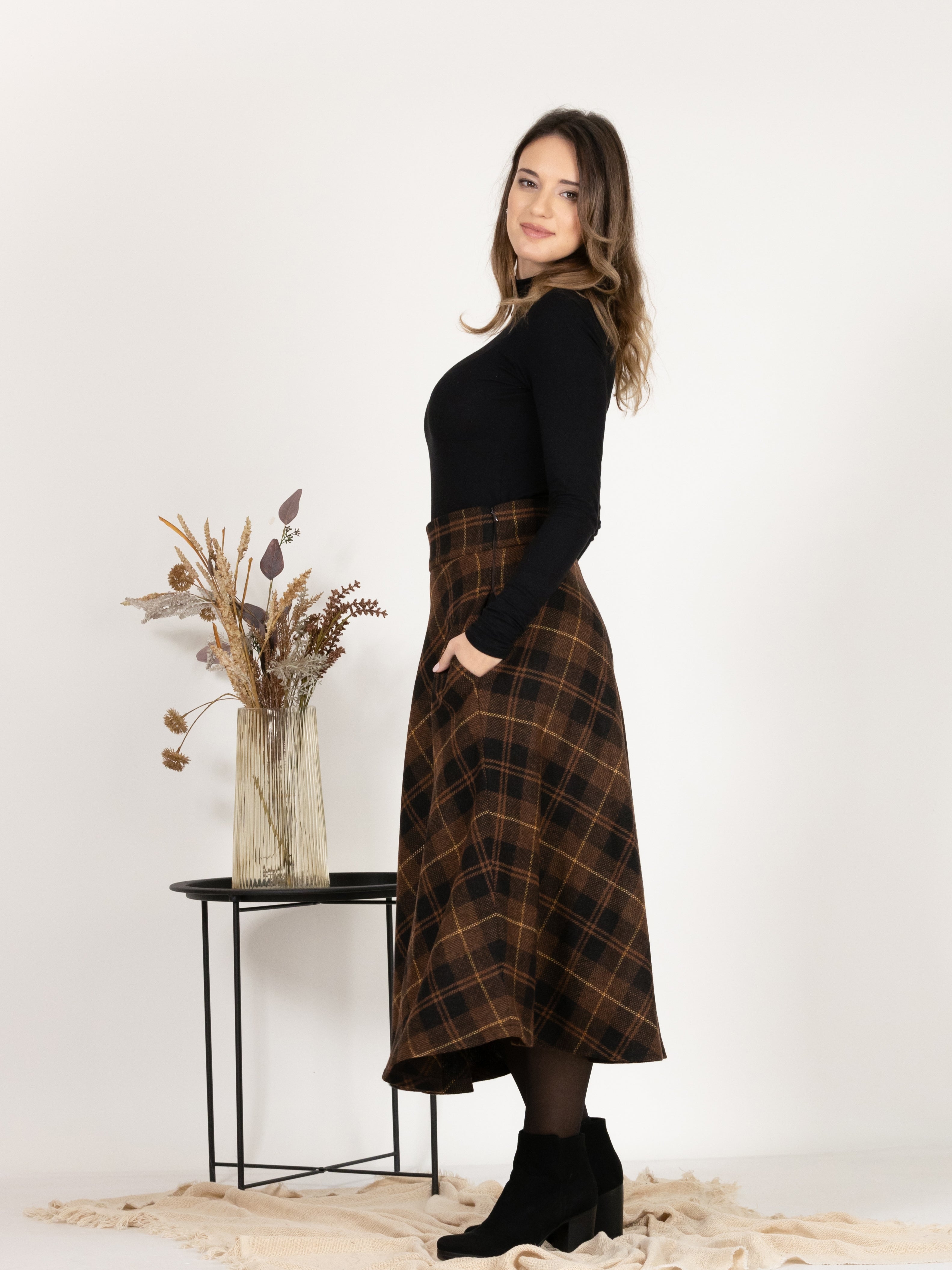Side view of Midi Wool Plaid Skirt with High Waist and Pockets
