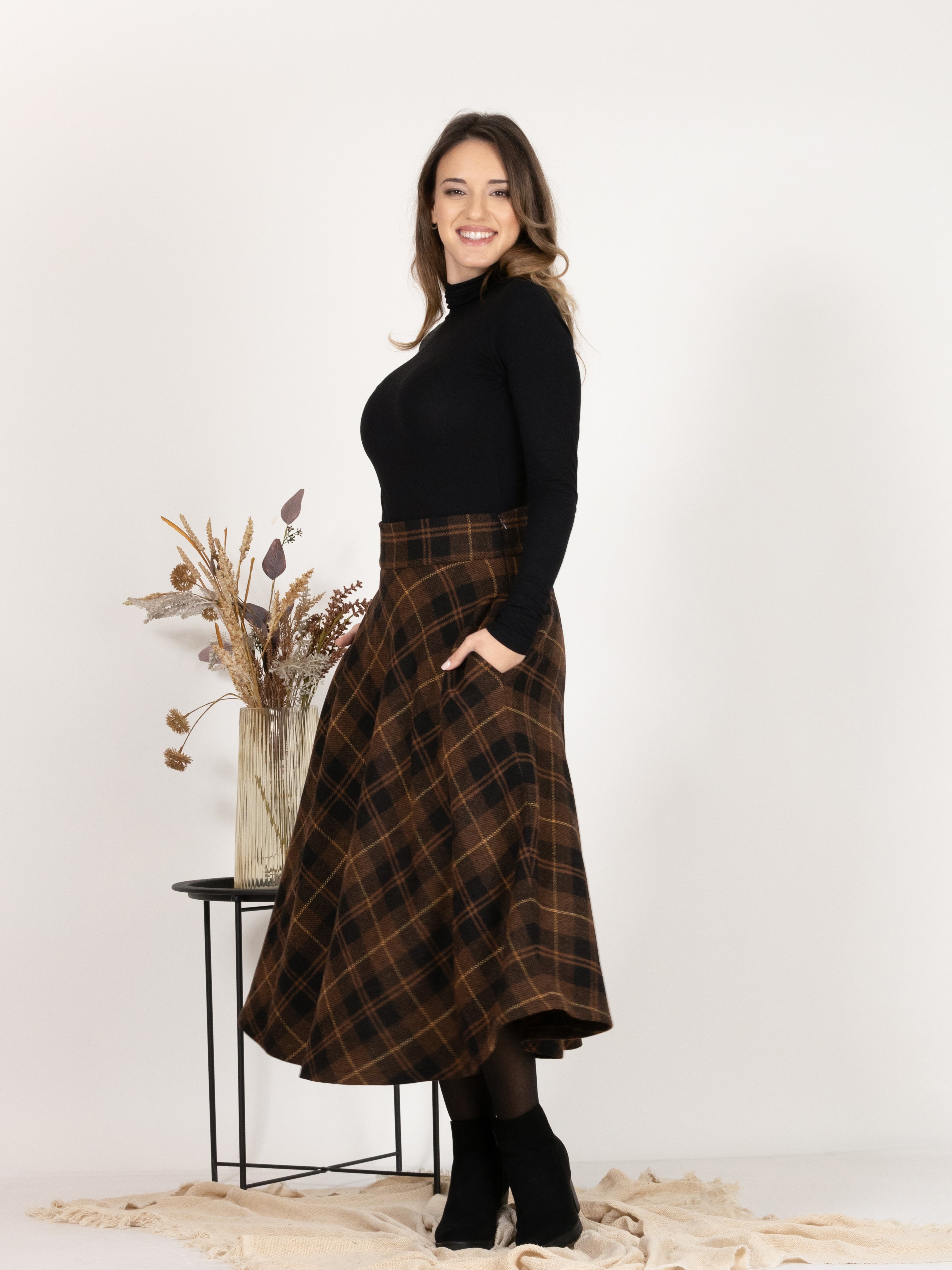 Front view of Midi Wool Plaid Skirt with High Waist and Pockets showcasing the convenient pockets