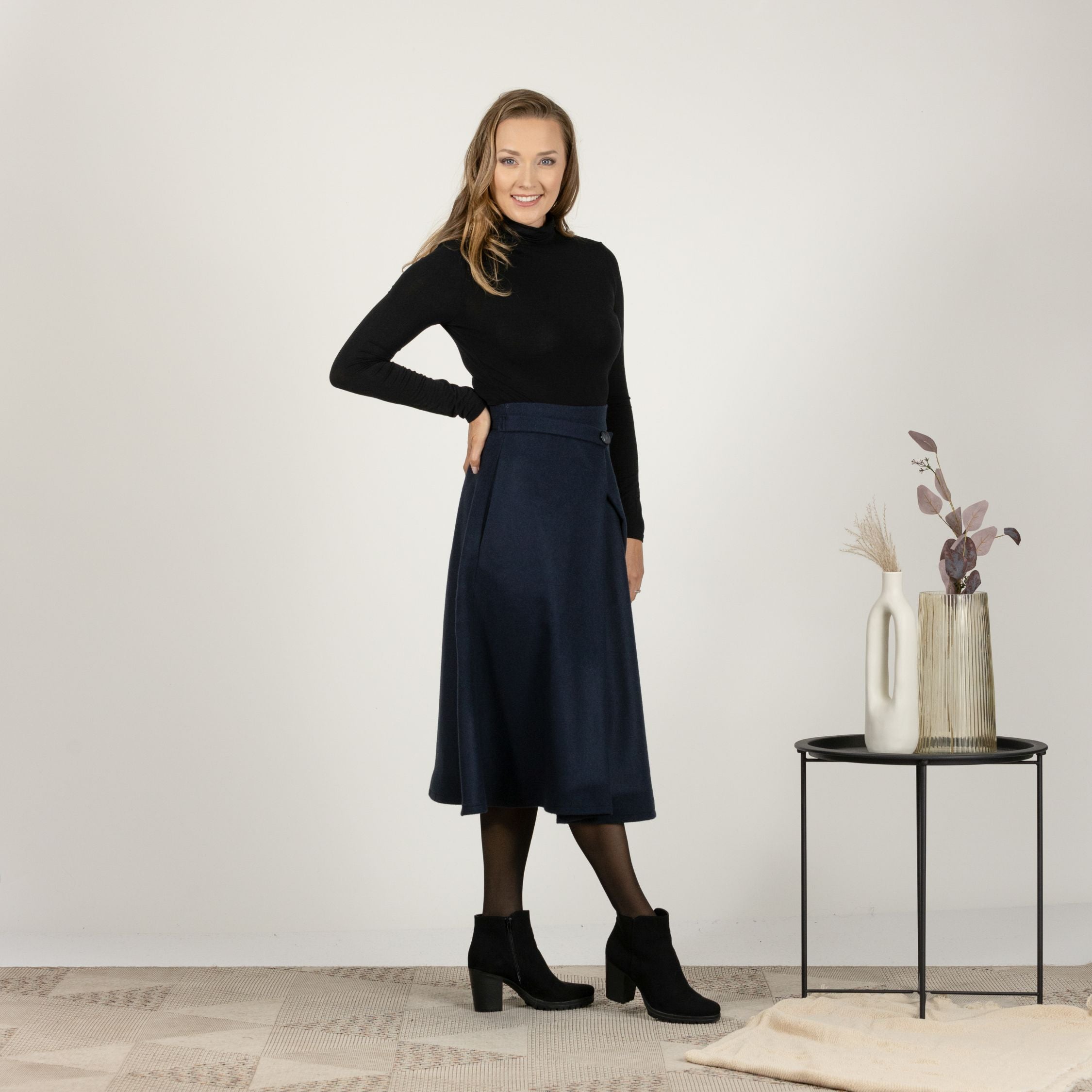 Side profile highlighting the flow and button detail of Wool Front Statement Skirt