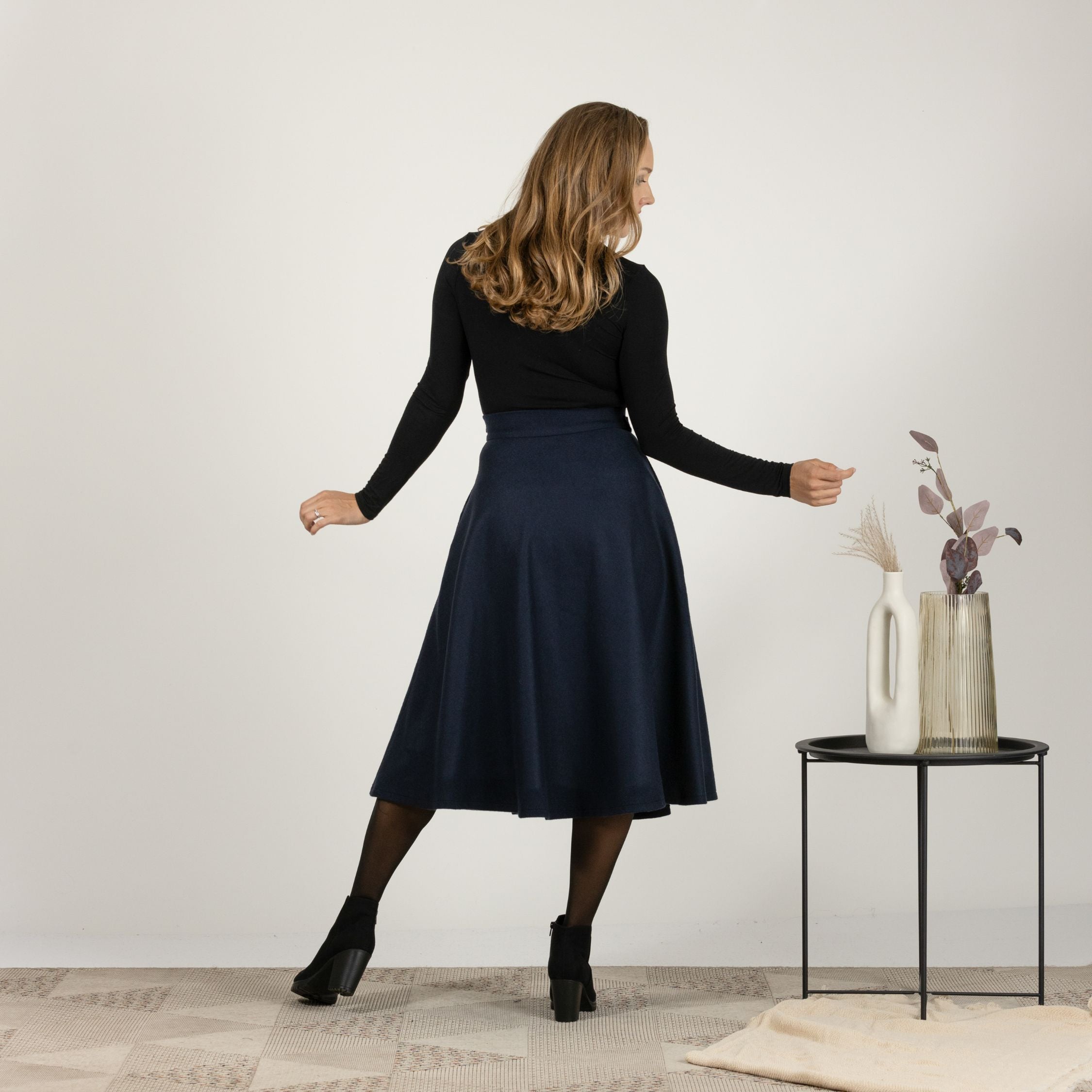 Back view emphasizing the retro-inspired design of Wool Front Statement Skirt