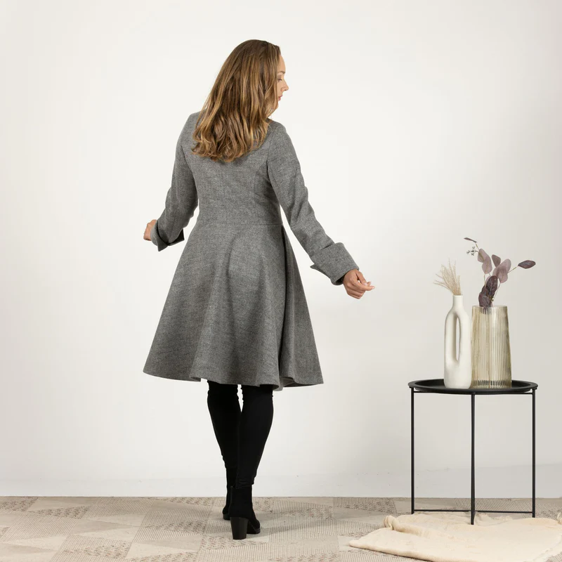 Back view of Warm A-line coat with refined style

