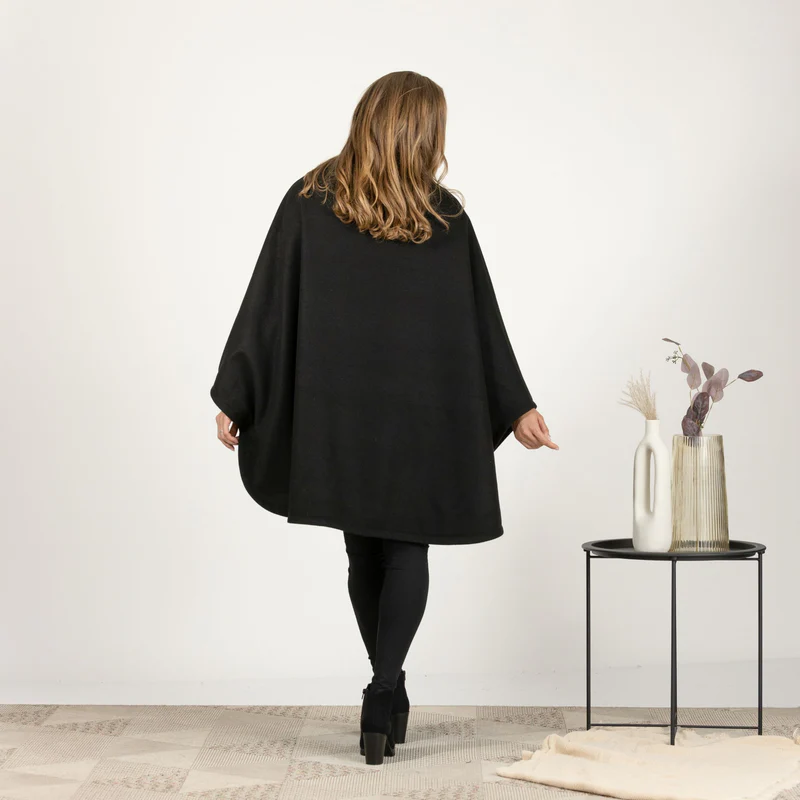 Back view of Poncho coat styled for fall

