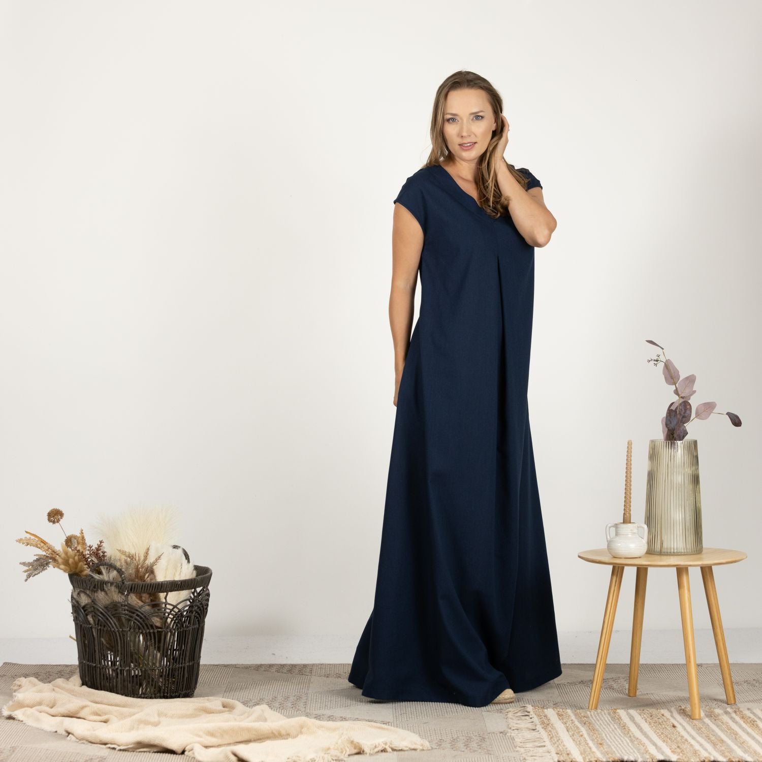 Front view of the Linen Loose Dress with Back Tie, focusing on the practical back tie and high-quality linen fabric.