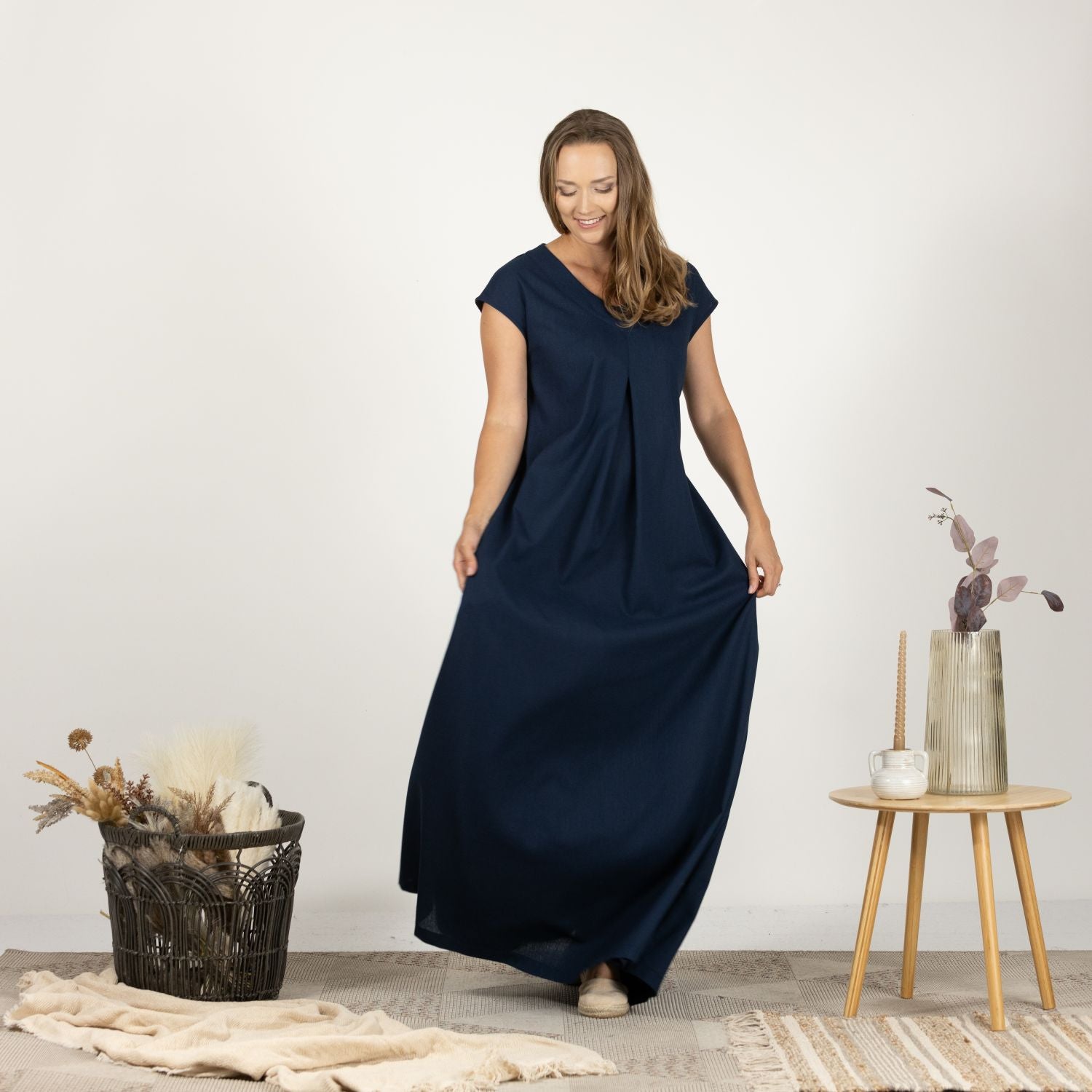 Front view of model wearing the Linen Loose Dress with Back Tie, presenting its easy-to-wear fit and full-length design.