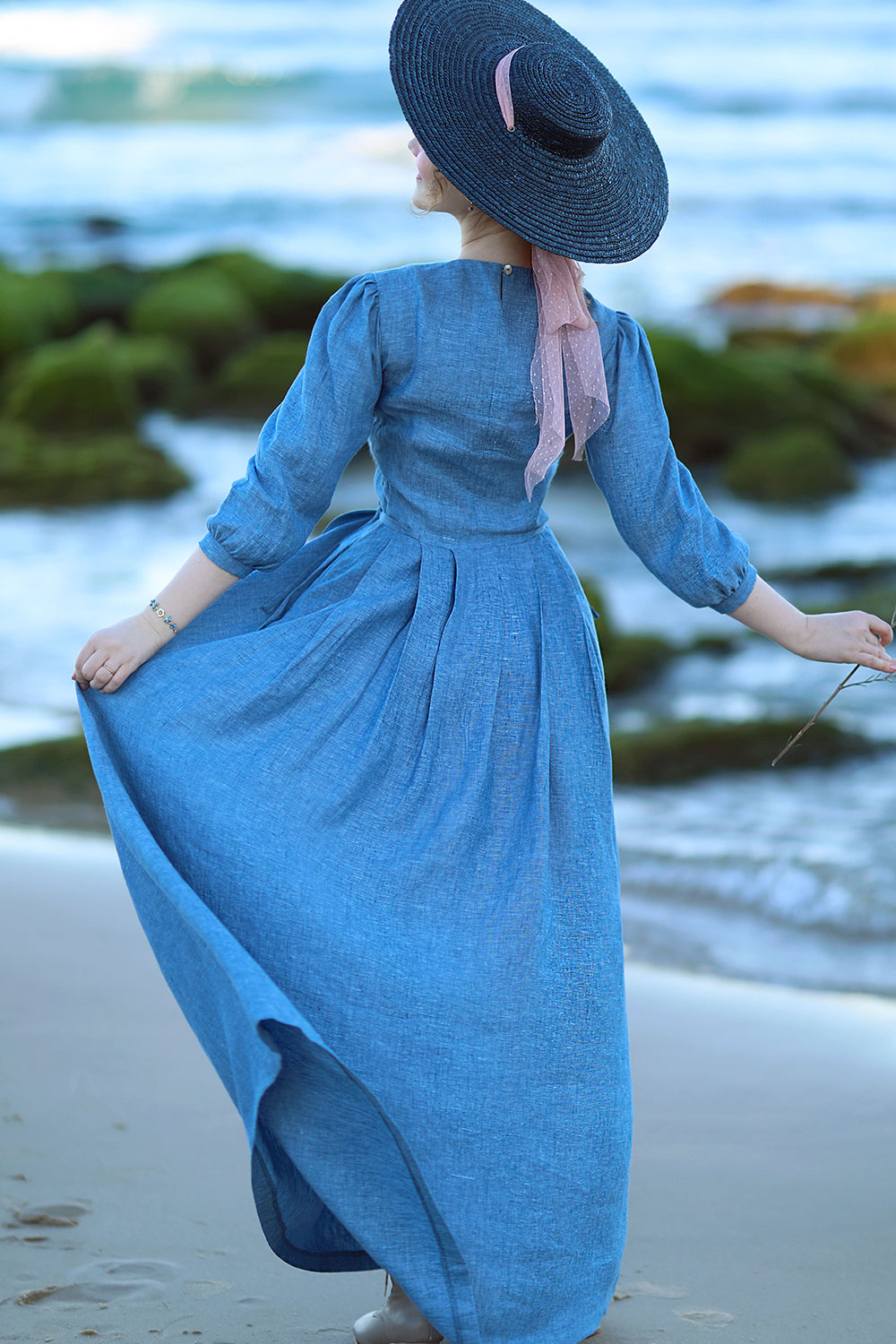 Back view of  Natural blue linen maxi dress with long sleeves

