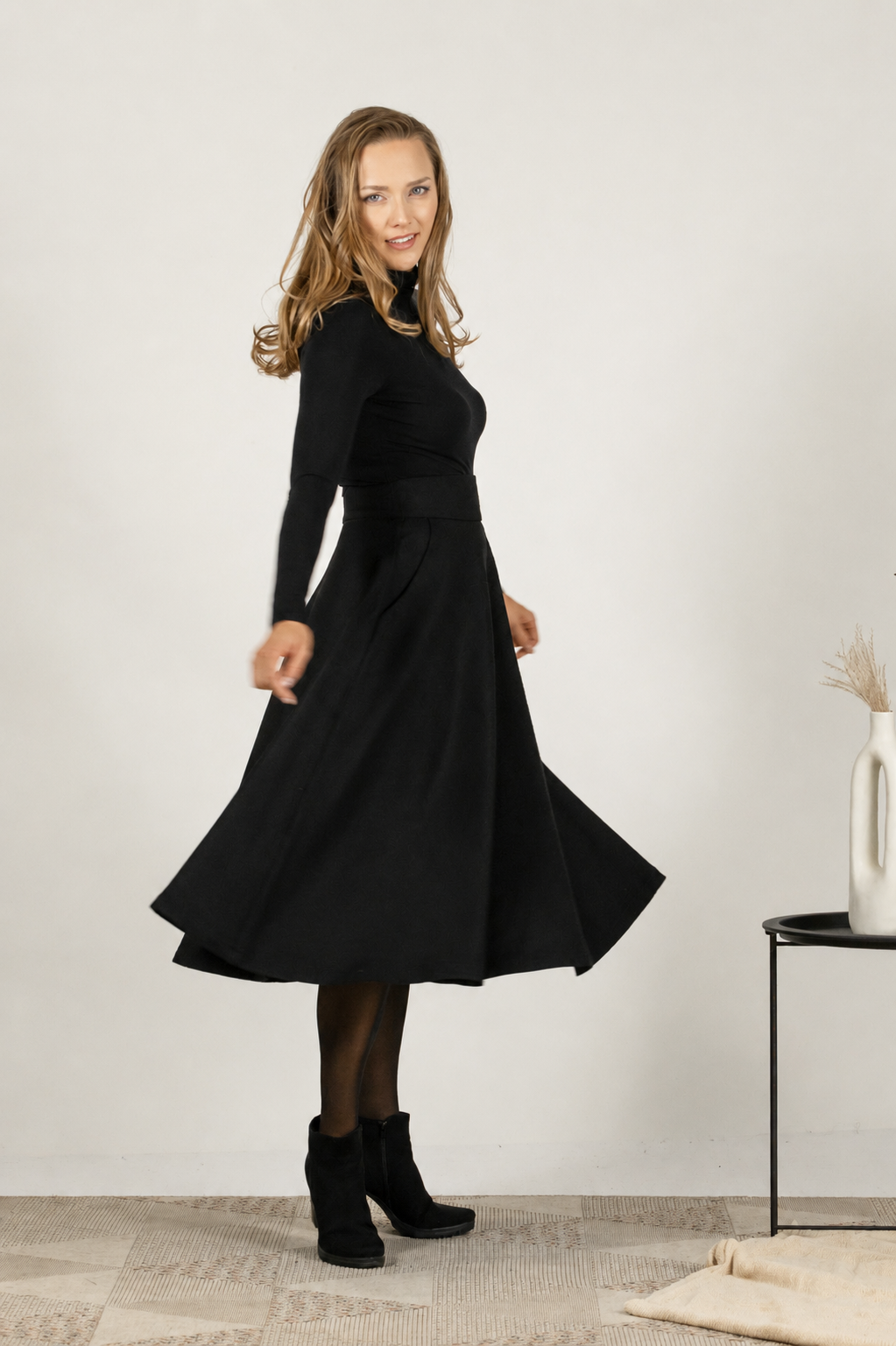 Black wool midi skirt with high waist