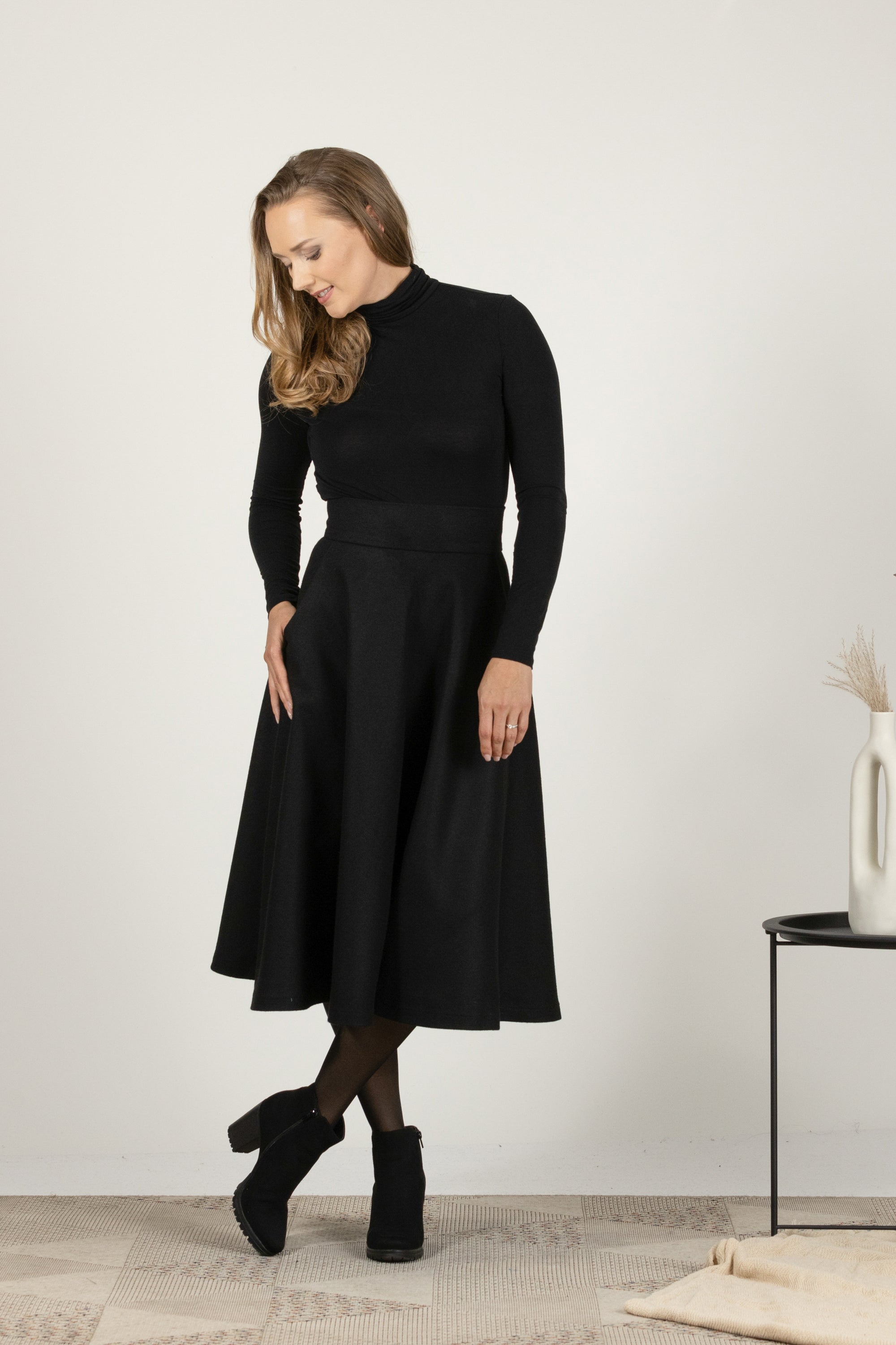 Black wool midi skirt with high waist