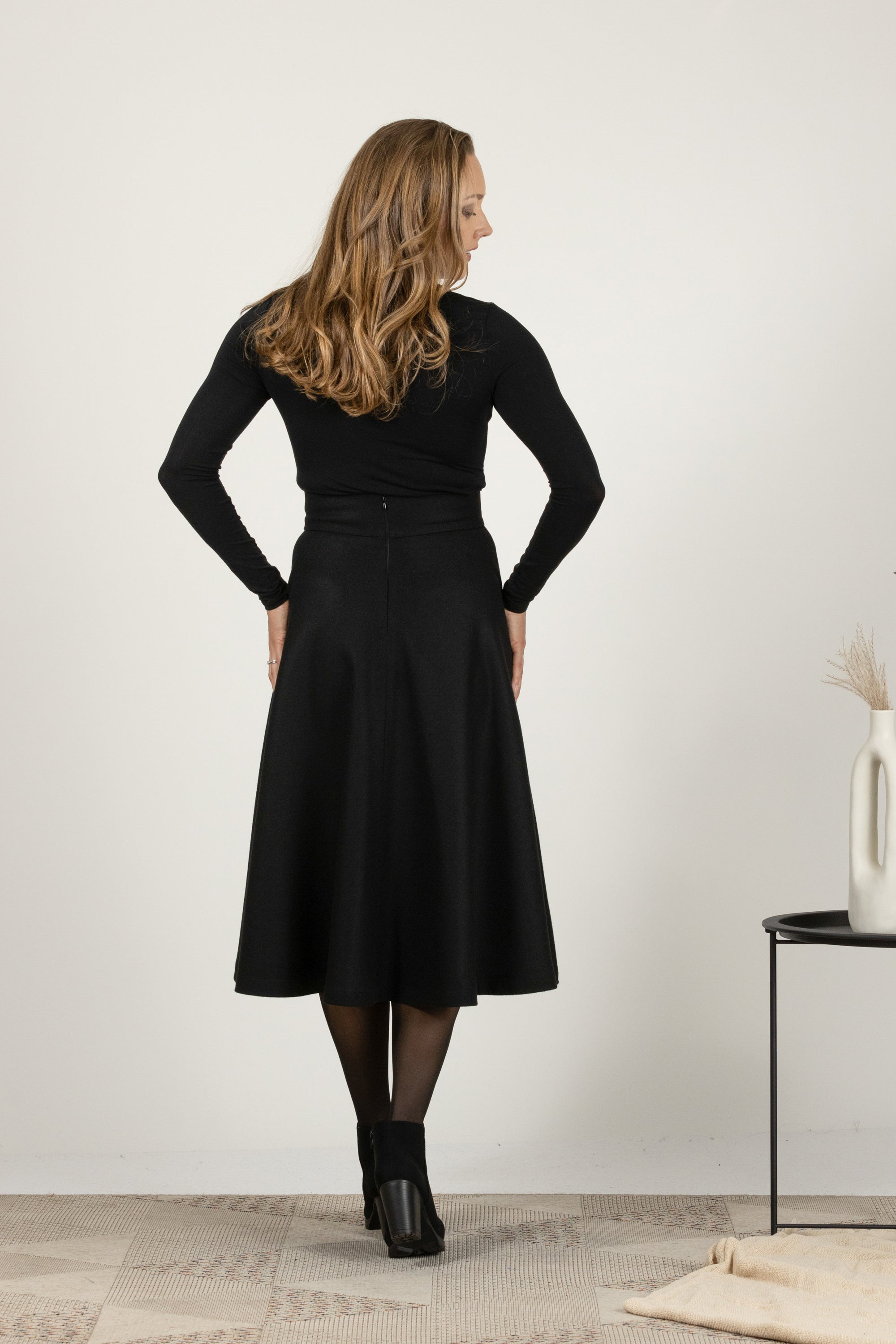 Black wool midi skirt with high waist