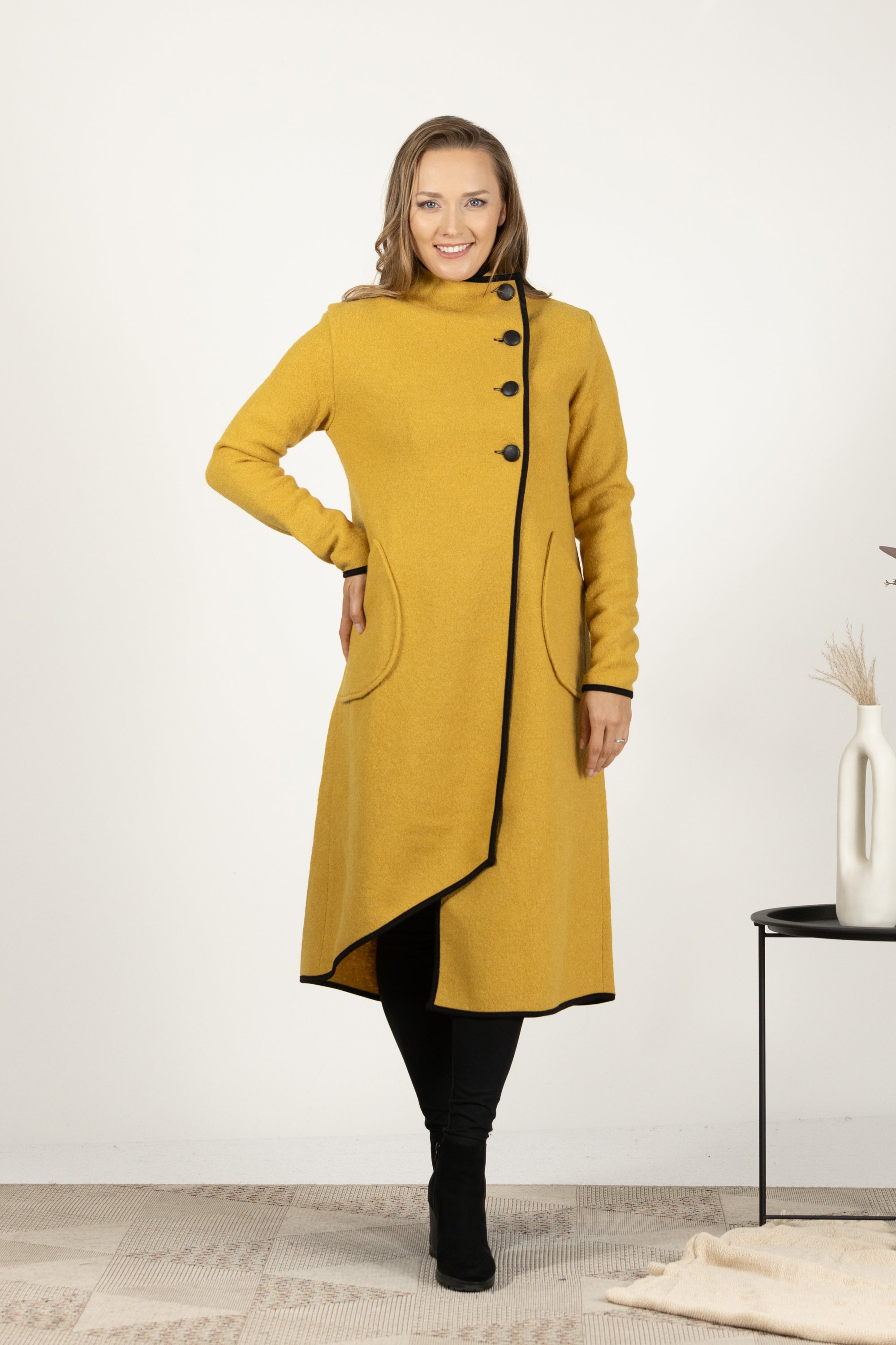 Stylish yellow boiled wool coat in raspberry tone