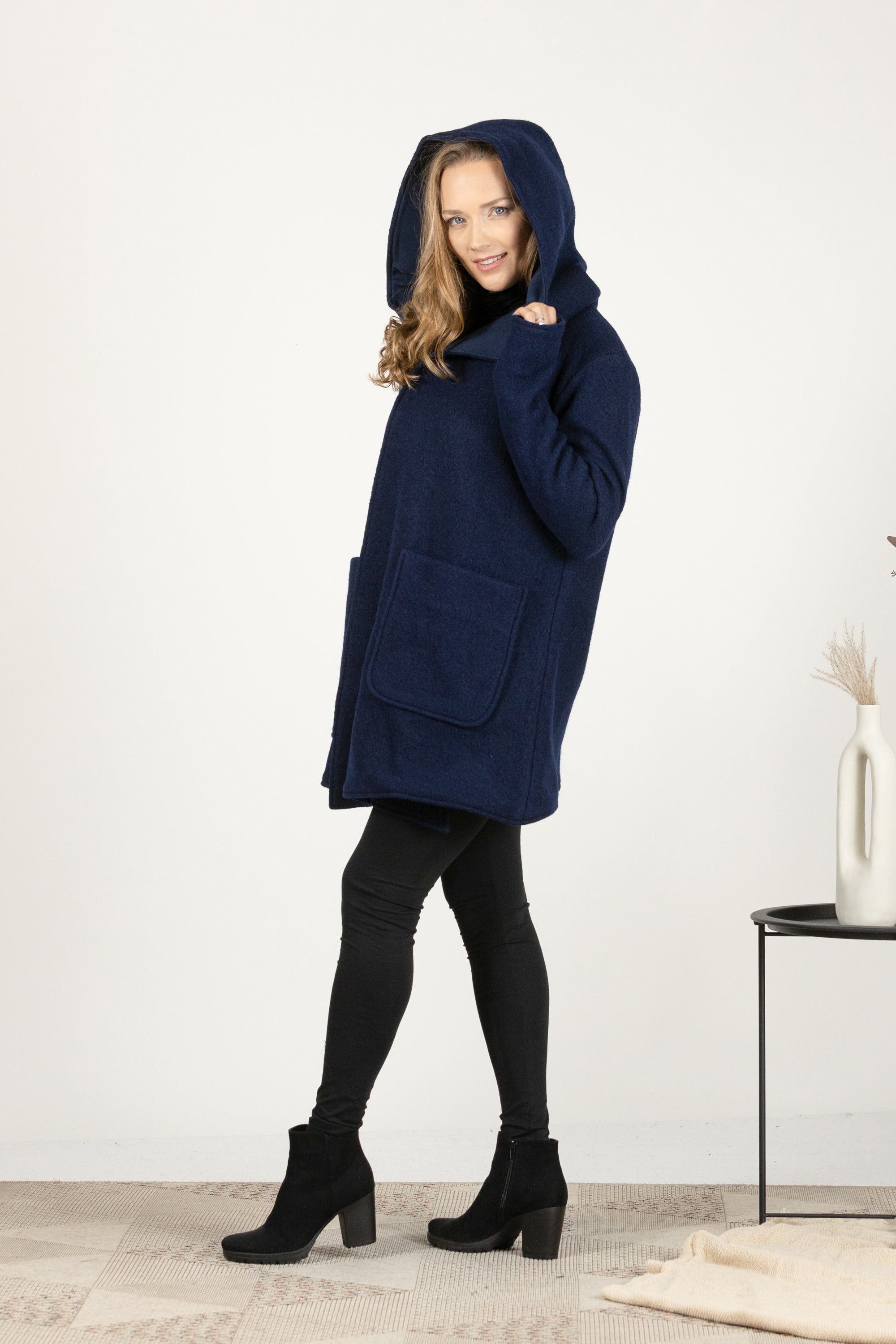Side view of Wool cardigan with hood and pockets