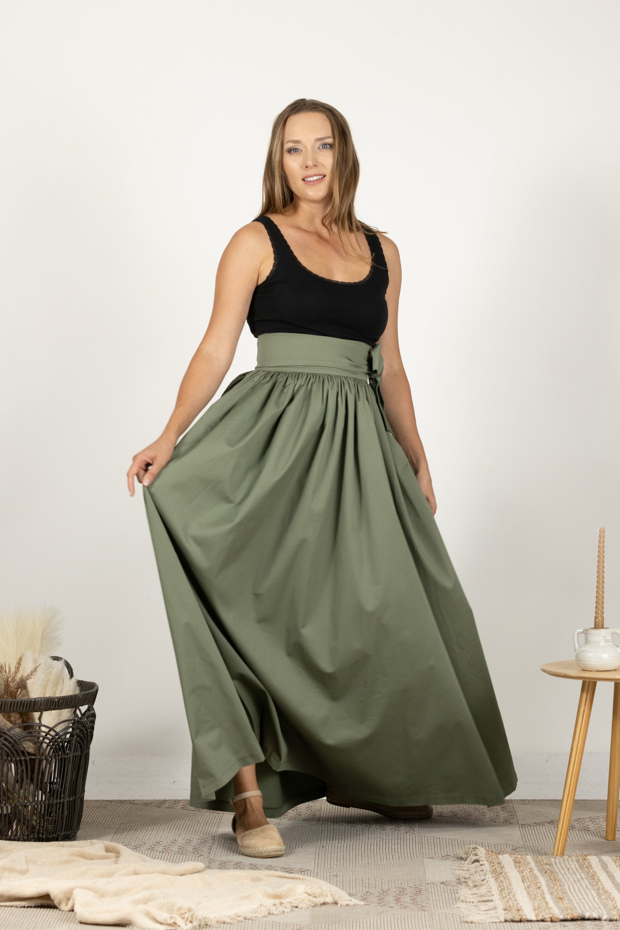Full-length dark green skirt perfect for formal or casual wear