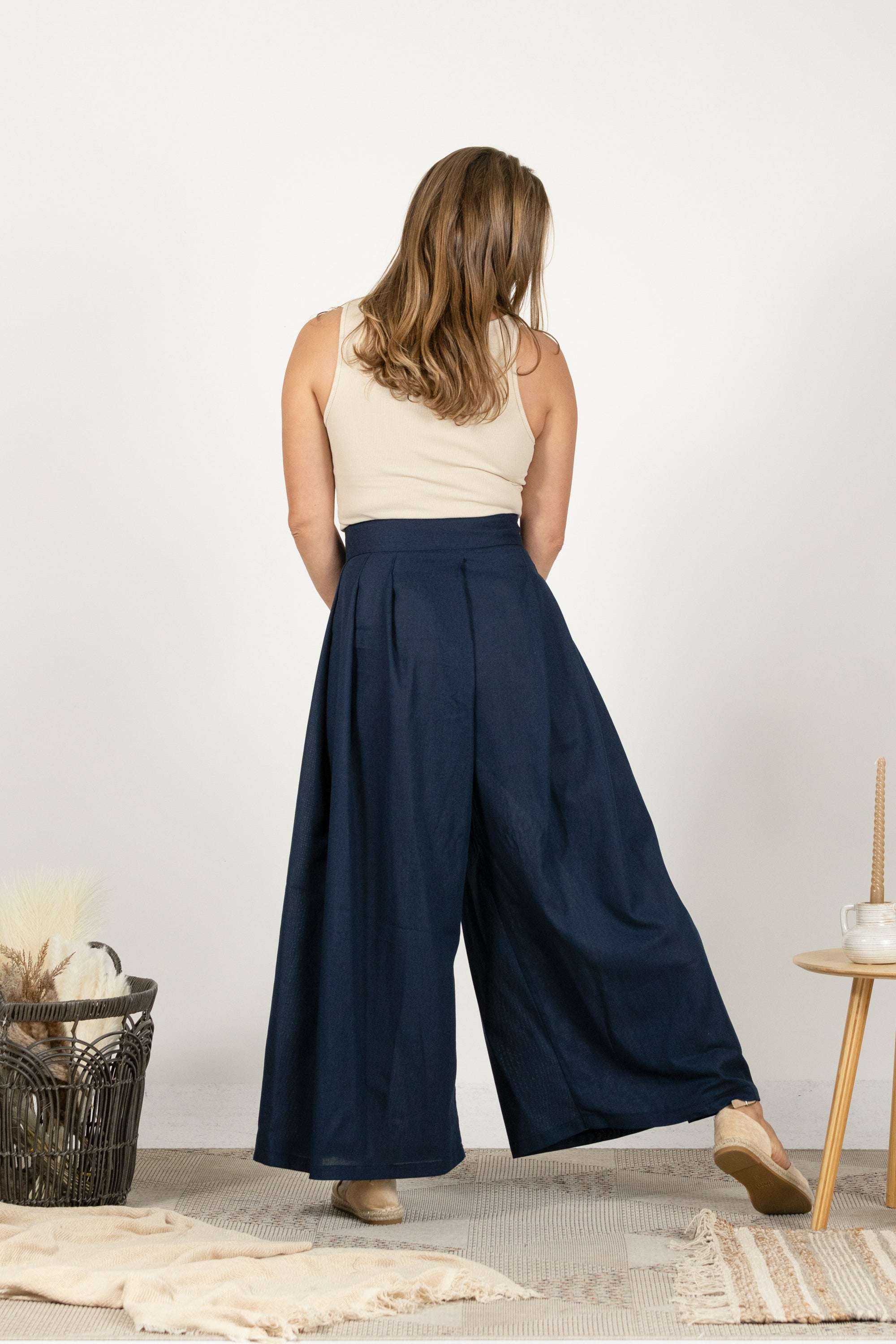 Back view of Maxi-length palazzo pants in dark blue melange