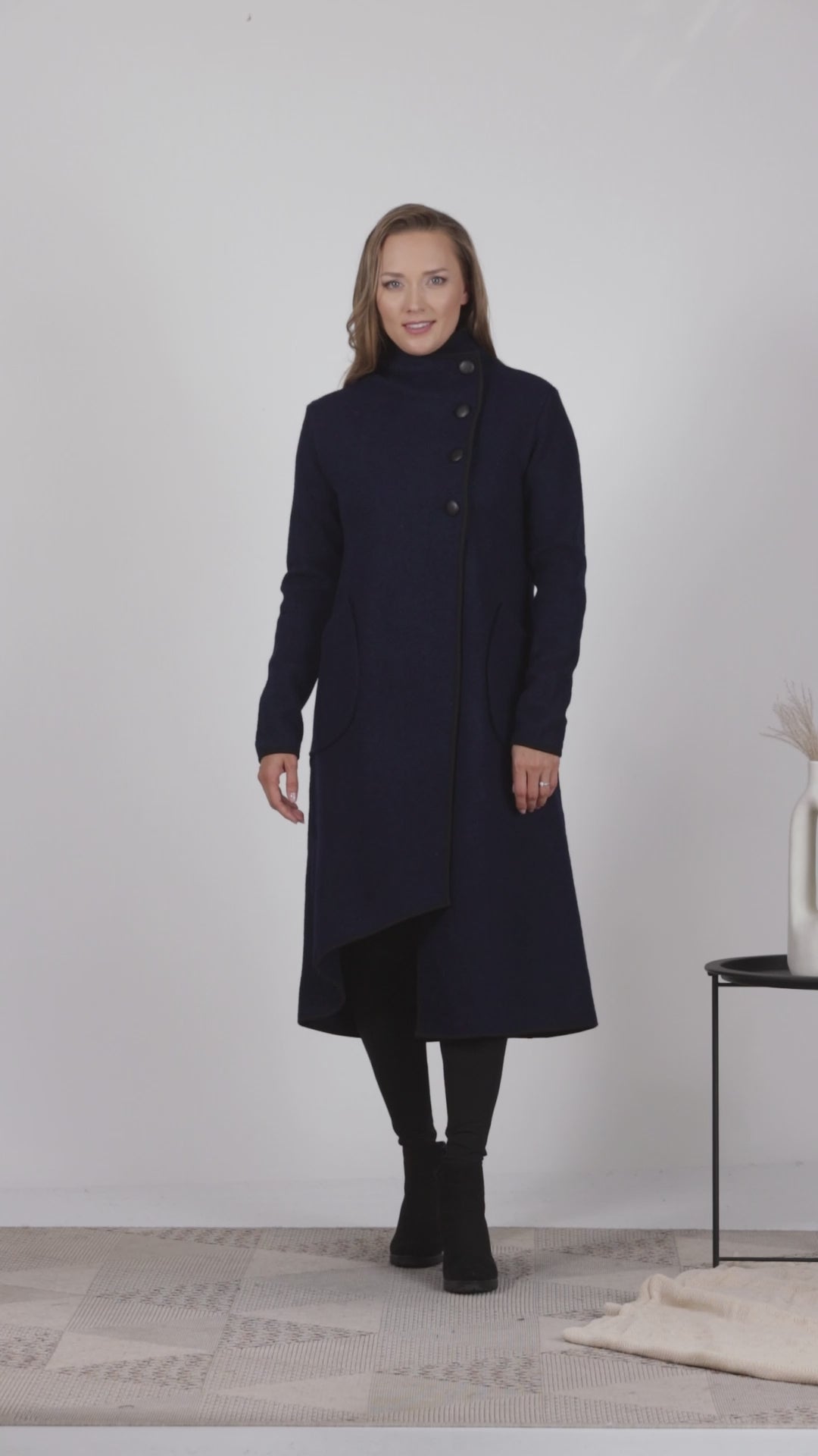 Full view of Dark blue boiled wool coat with high collar