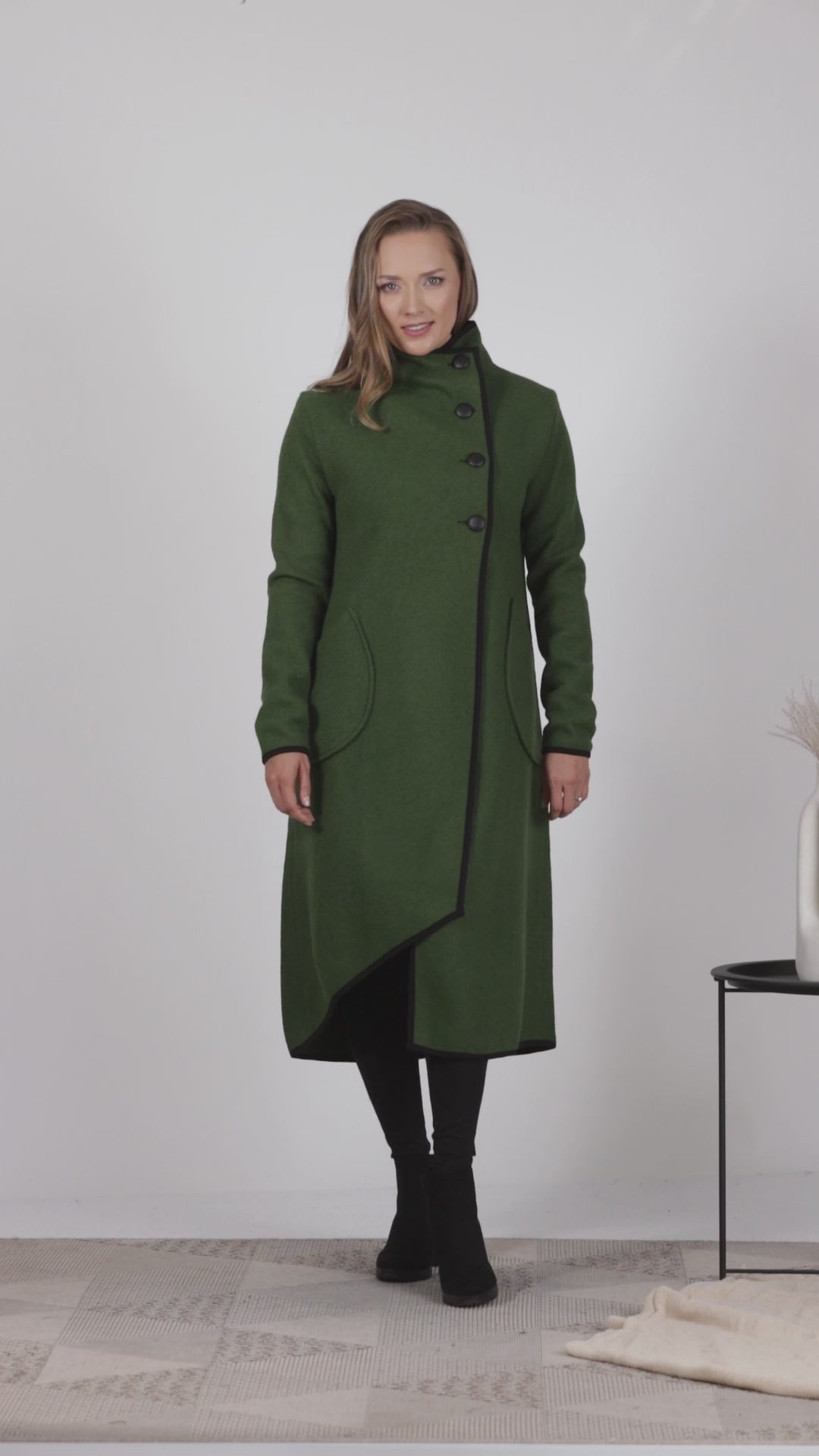 Full view of Dark green wool coat with classic silhouette