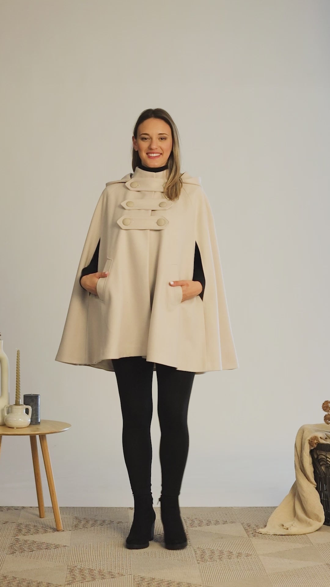 Complete design of  off-white hooded wool cape coat