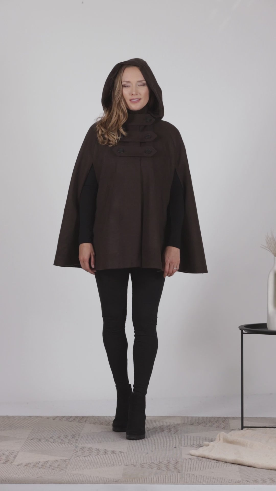 Full view of Brown wool cape coat with hood and buttons