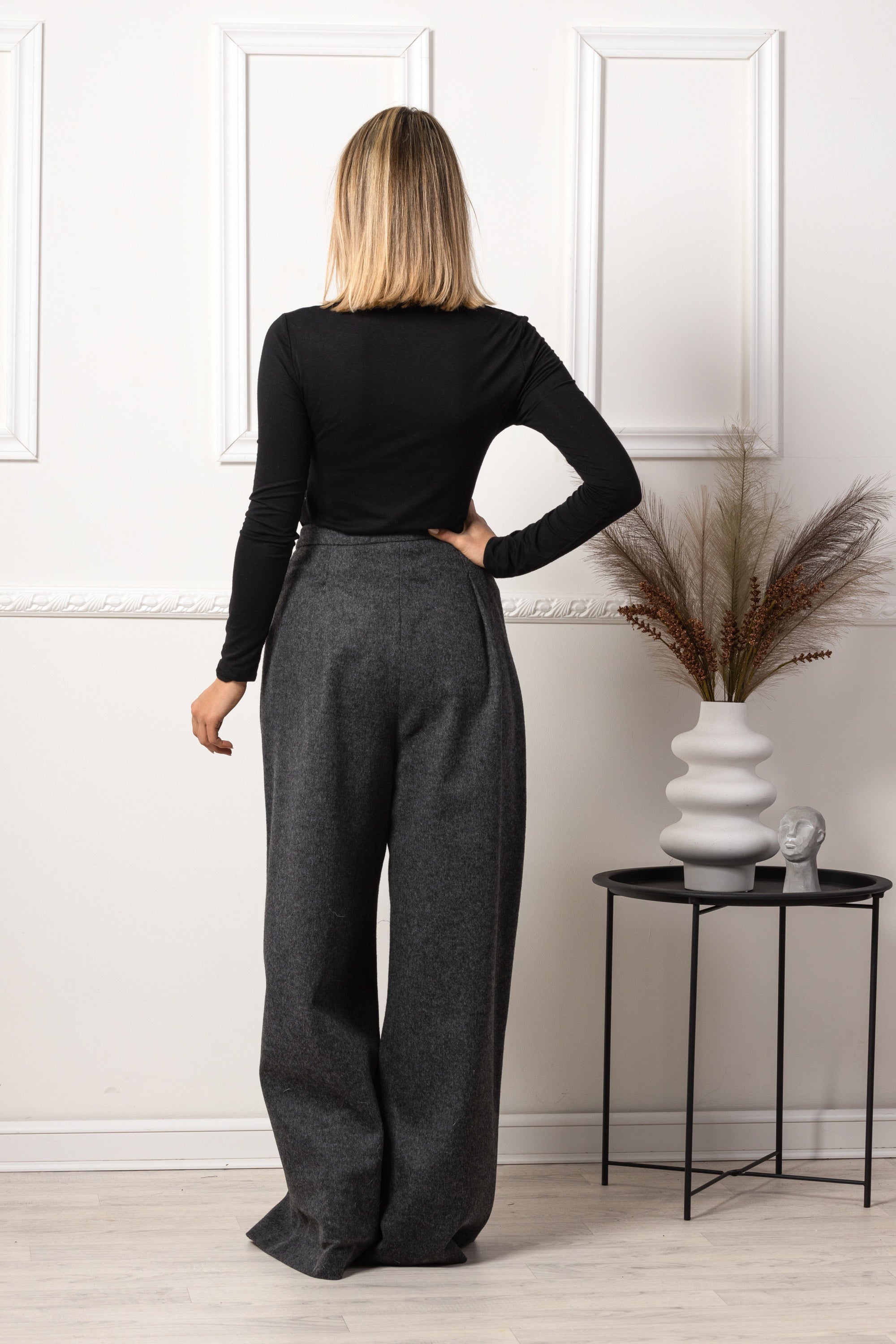 Back view of Classic wool pants with wide leg cut

