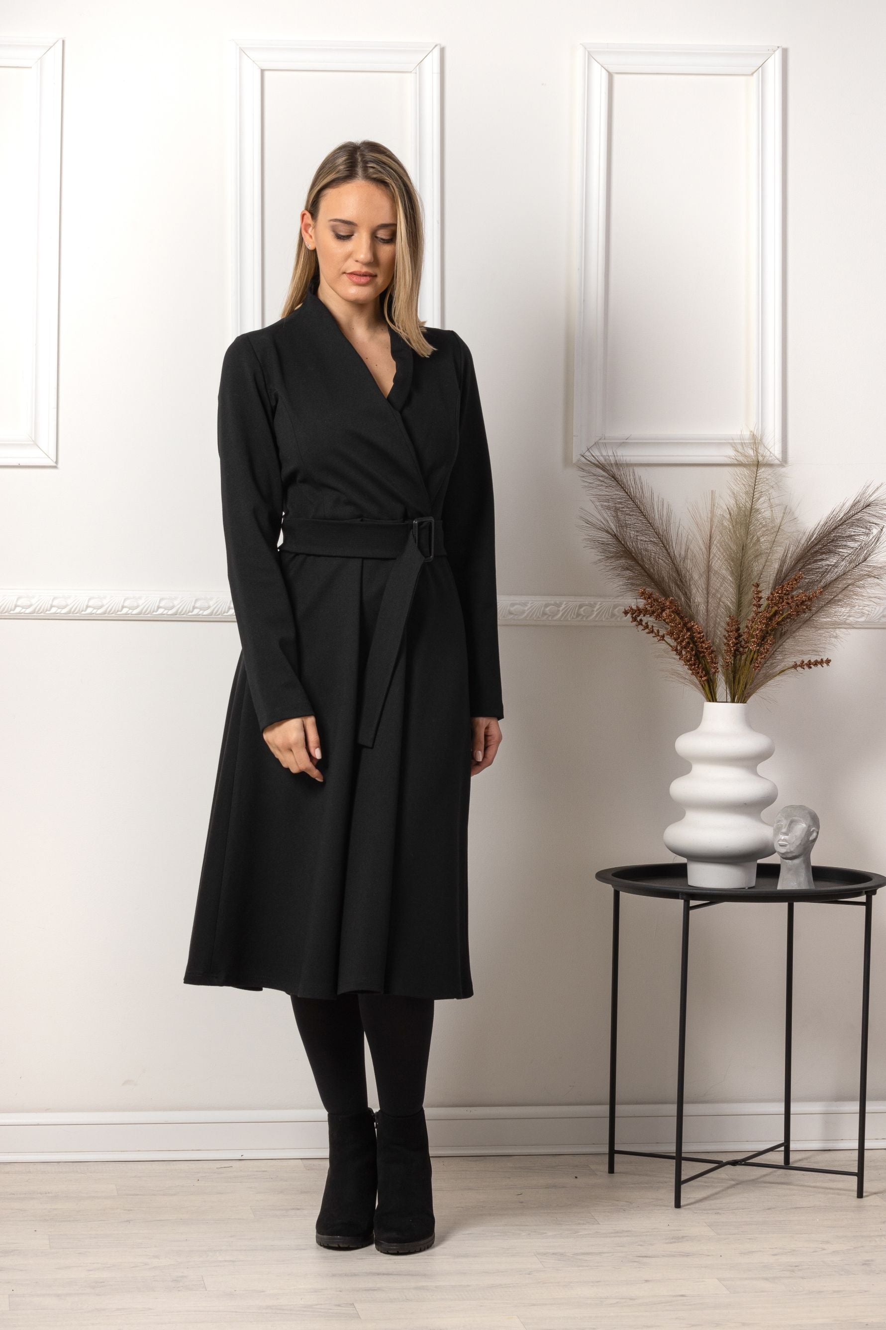 Close-up of the A-Line Belted Black Dress fabric - NikkaPlace | Effortless fashion for easy living