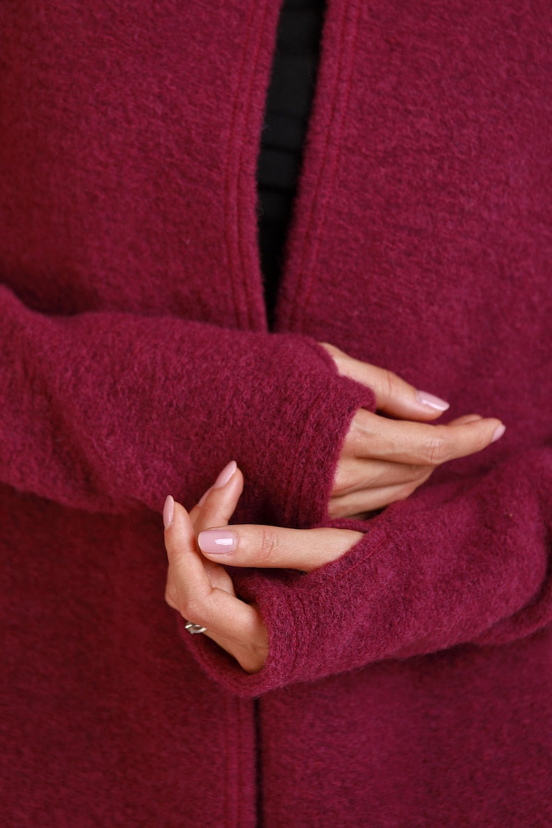 Close-up of Italian boiled wool cardigan with belt

